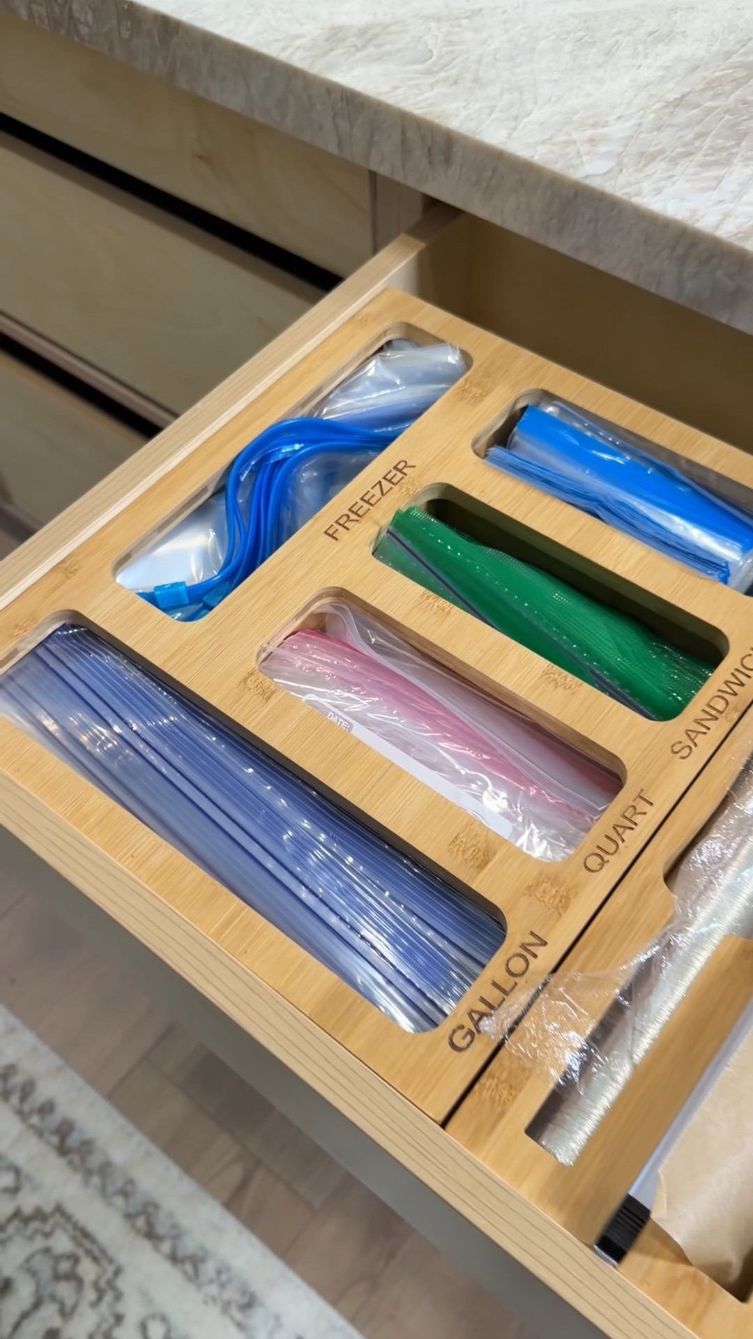 ✨ This is genius! I can’t believe I waited this long to organize my food storage bags. Everything is labeled, easy to grab, and finally has its own place. It keeps my kitchen drawers looking so clean and organized, and honestly just makes everyday life so much easier. One of my favorite kitchen organization finds!

🤎 ¡Esto es una genialidad! No puedo creer que esperé tanto para organizar mis bolsas de almacenamiento. Ahora todo está perfectamente clasificado, fácil de encontrar y siempre en su lugar. Mantiene mis gavetas súper organizadas, se ve hermoso y hace que todo sea mucho más práctico. ¡Sin duda, uno de mis organizadores favoritos para la cocina!

Shop the links below.

Follow me on Instagram and YouTube @kirasfashionfinds

#LTKHome #LTKvlog