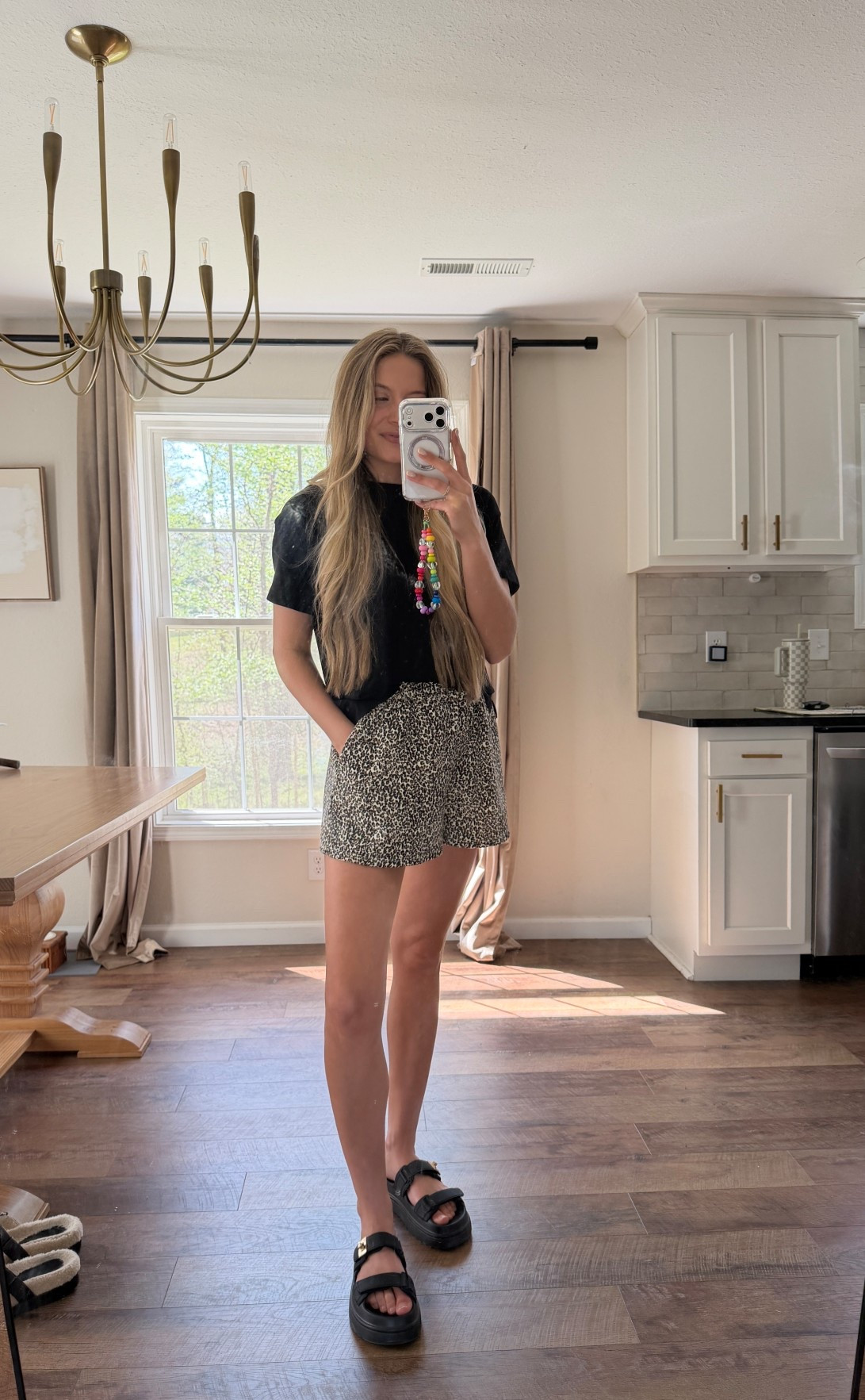 A pair of my favorite shorts! Elastic waist and SO comfy— these are so easy to dress up or down! Casual here with a tee or add a bodysuit or button down with a kitten heel. A love!! #leopard #shorts #springstyle  @VICI 

#LTKootd