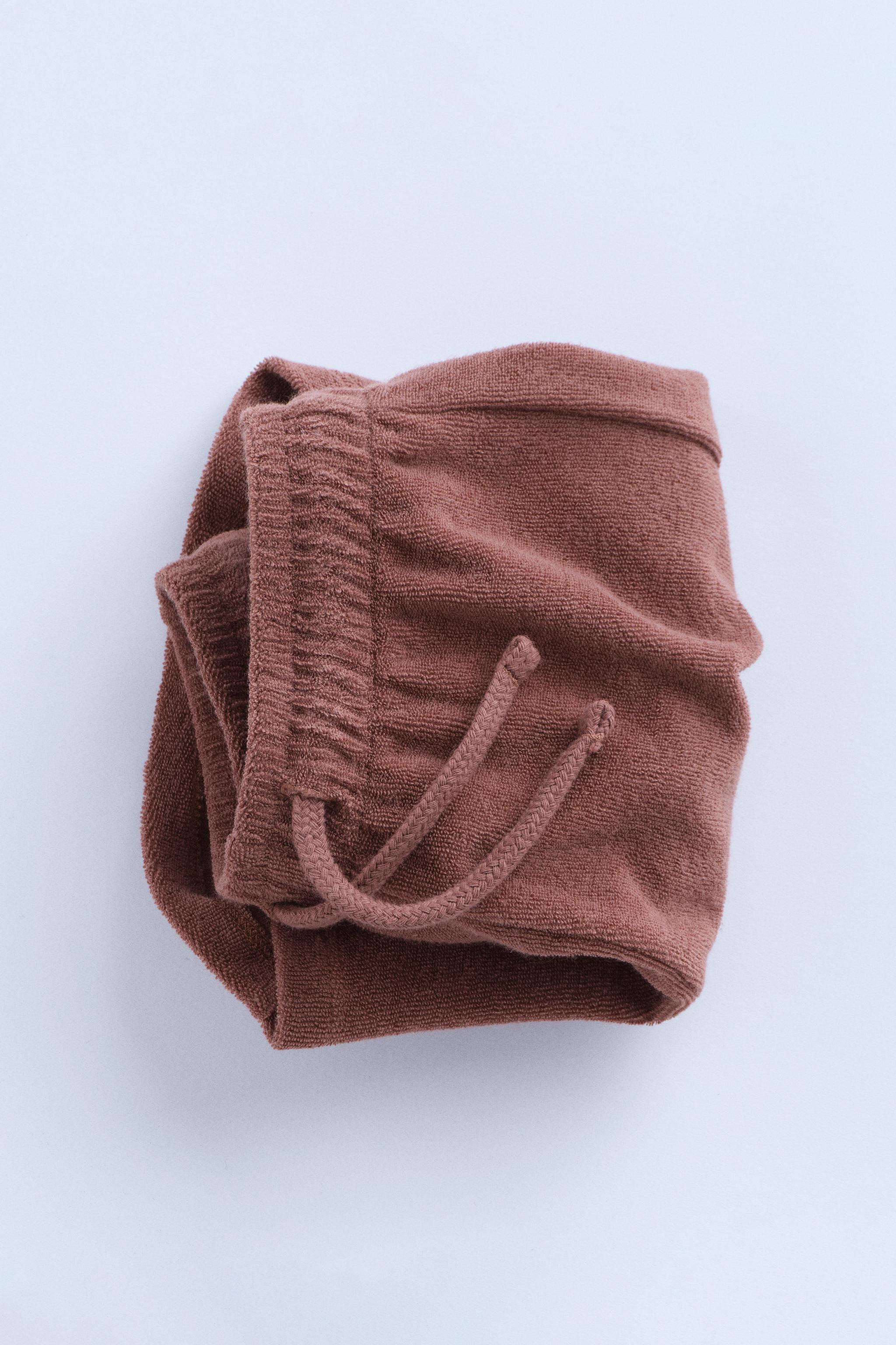 Cotton terry towelling Bermuda shorts. Featuring an elasticated waistband for comfort and adjusta... | Zara UK