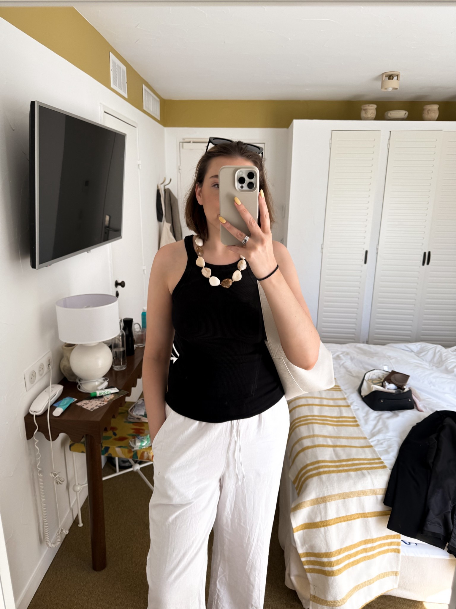 Comfortable, monochrome holiday outfit with linen trousers and the Uniqlo bra top 

#LTKuk #LTKstyletip #LTKsummer