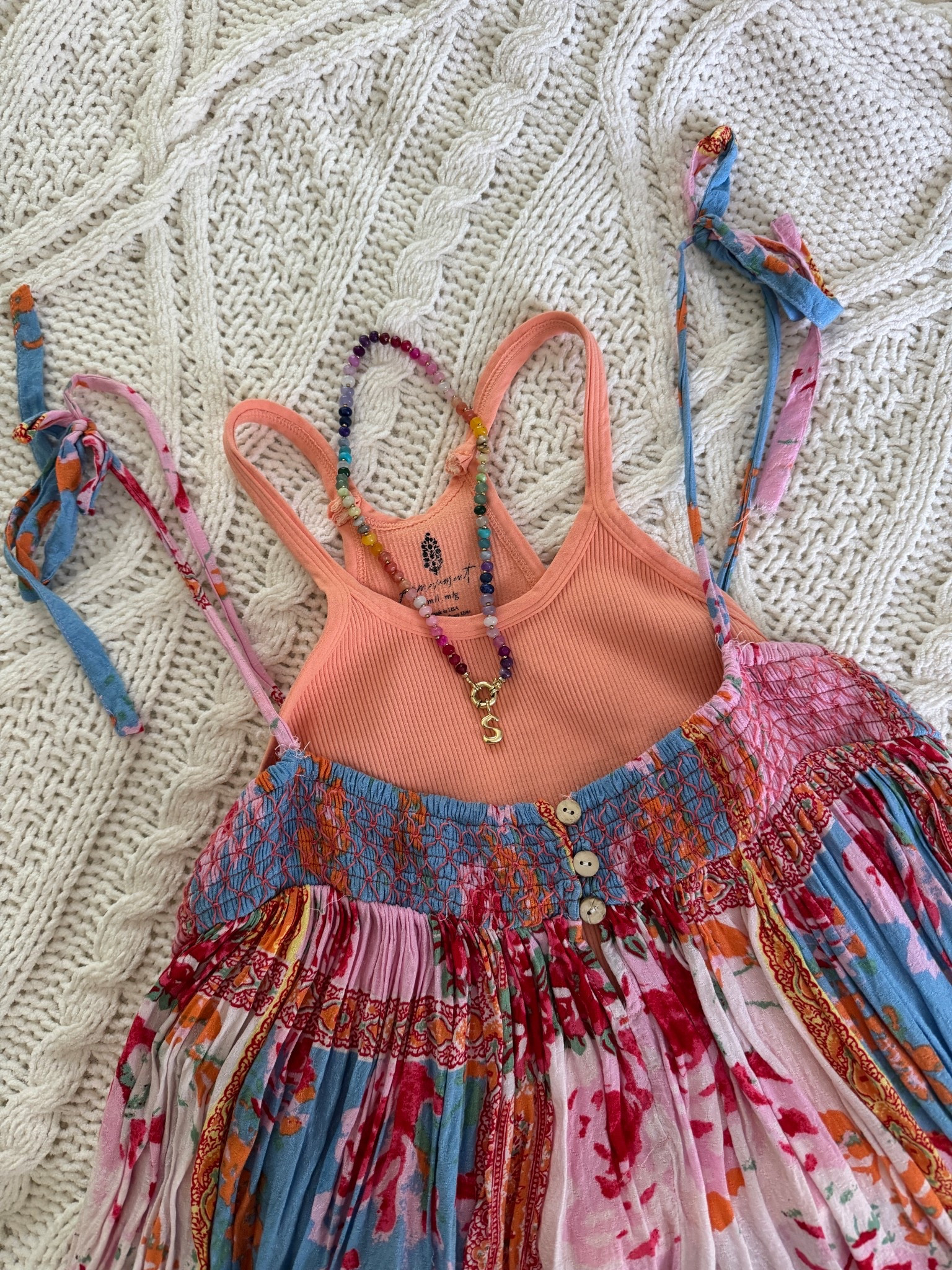 Packing my bags for Mexico!! I’ve worn this romper every year as a vacation outfit, but I love this coral ribbed tank top from free people underneath too. Runs true to size 

#ltkfindsunder50 #ltkseasonal #ltktravel

#LTKFindsUnder100