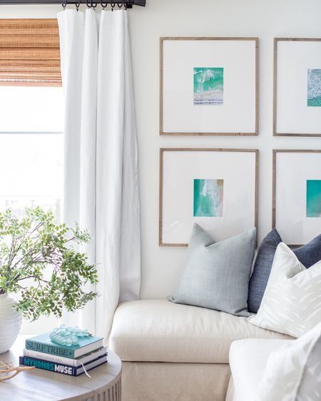 *Coffee table restock alert * Our Omaha updated cozy den with a linen sectional, linen blackout drapes, woven bamboo window coverings, faux greenery, a round wood coffee table styled with coastal decor, an oversized gallery wall, and spring pillows! See more of this space here: https://lifeonvirginiastreet.com/benjamin-moore-hale-navy/.

#ltkhome #ltksalealert #ltkstyletip #ltkseasonal #ltkfamily #ltkfindsunder50 #ltkfindsunder100

#LTKhome #LTKsalealert 

#LTKSeasonal #LTKSaleAlert #LTKHome