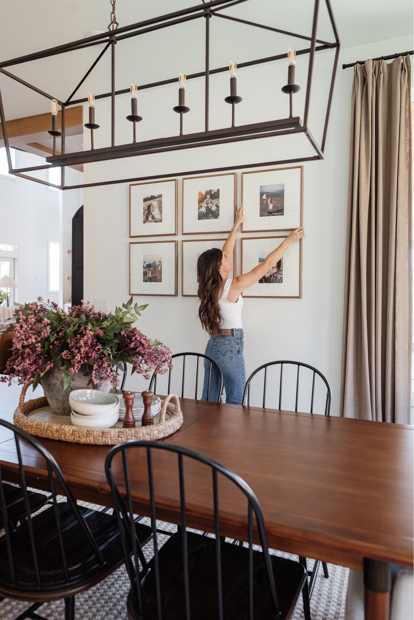 Our dining room always felt unfinished so I grabbed these oversized frames from @wayfair and this small upgrade had major impact! You can find almost everything in our dining room on Wayfair! 

#Wayfair #WayfairPartner 

Home decor, gallery wall, dining room, dining table, dining chairs, chandelier, rug, faux stems, tray 

#LTKHome #LTKFamily #LTKStyleTip