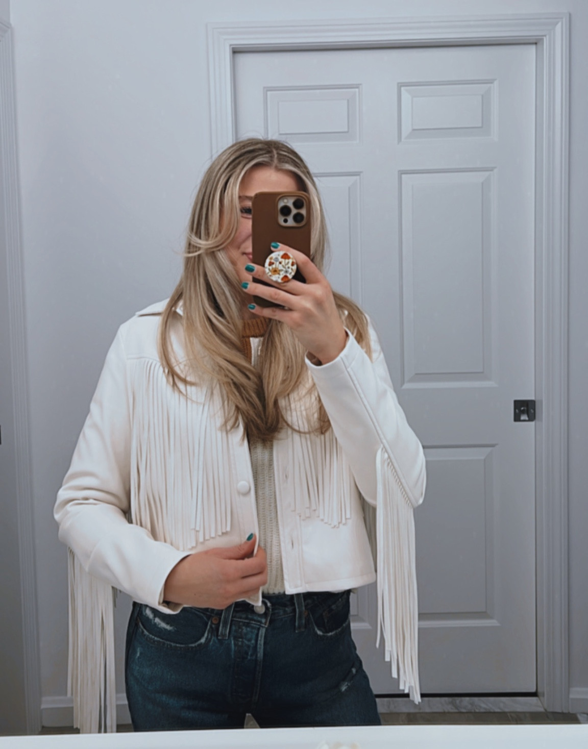 Feeling fringey 🤠 can’t get over this white leather fringe jacket from Target! I’m wearing a size small. Also living in these Levi jeans, wearing a size 26 in these!

#LTKunder50 #LTKstyletip #LTKfit
