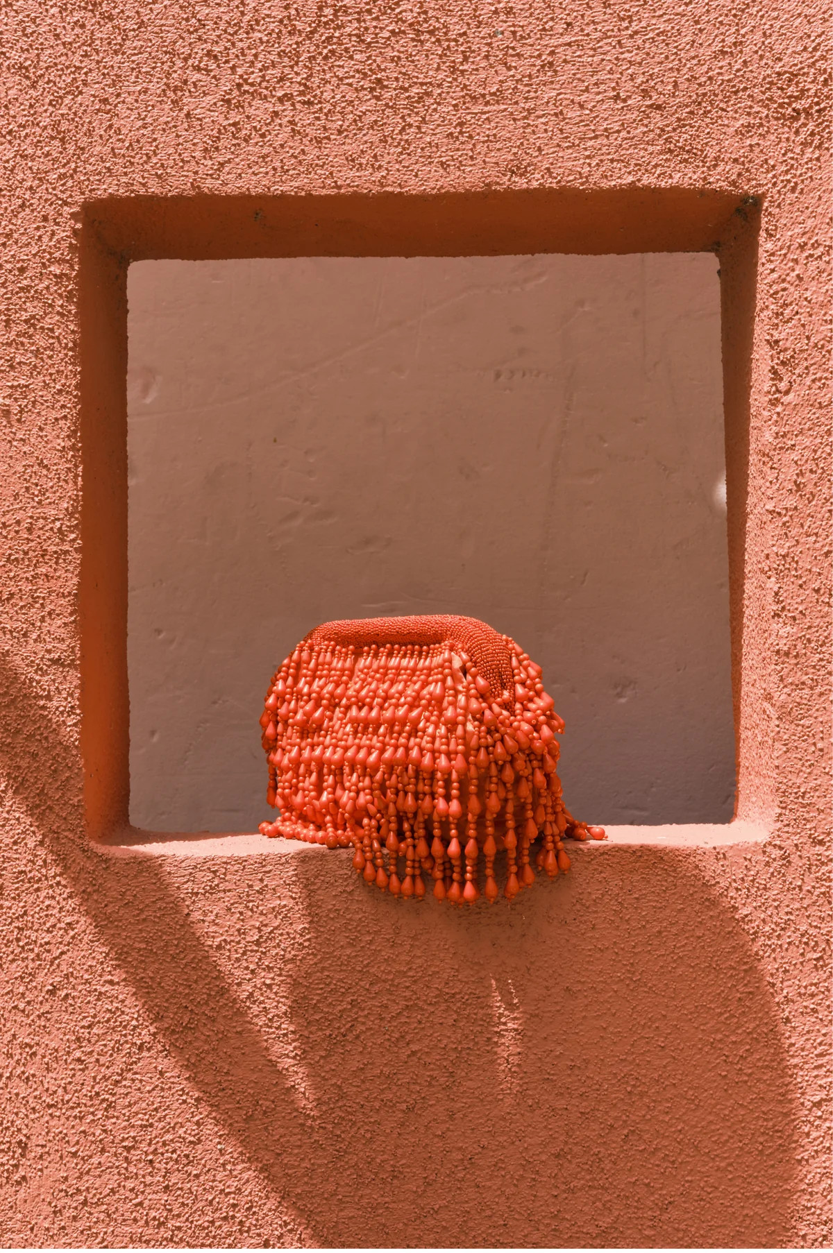 Beaded Drop Clutch In Orange | Simon Miller