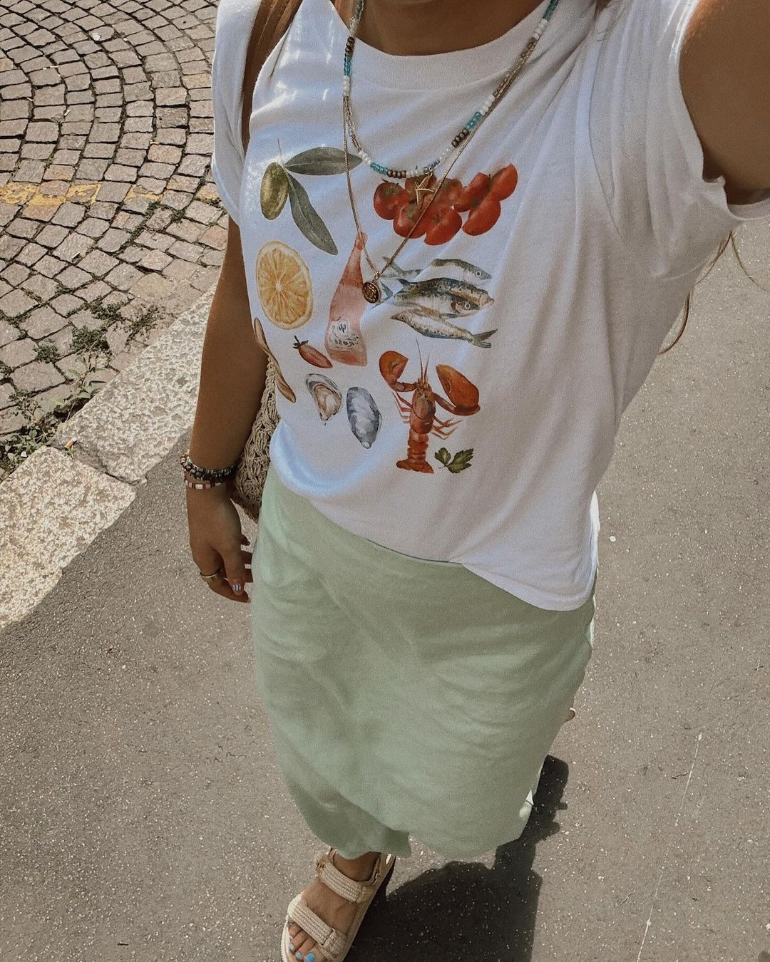 Summer in Italy 🦞🇮🇹🦪🌅⛵️🐚

European summer, summer outfit, travel outfit, sandals, midi skirt, baby tee, graphic tee, graphic t shirt, aesthetic, outfit ideas, vacation outfit, Italy outfit

#LTKFindsUnder100 #LTKTravel