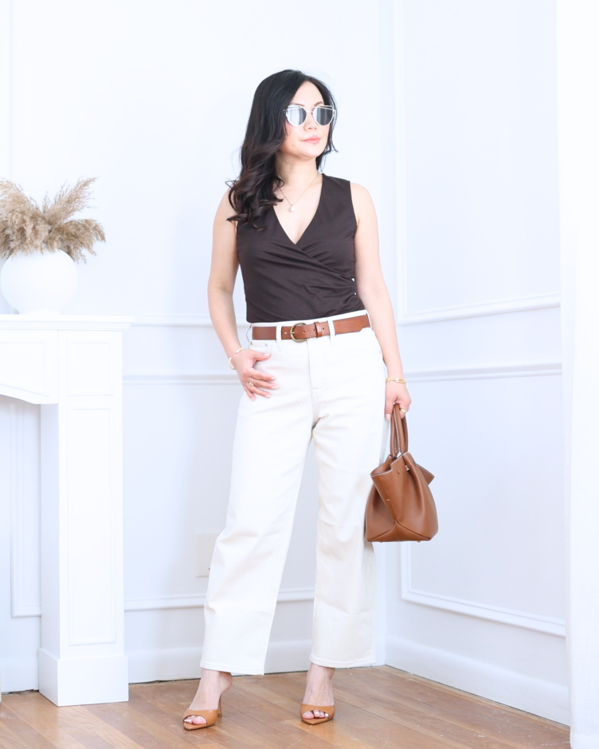 Ruched wrap top from Mango paired with white barrel jeans from J.Crew Factory — flattering, modern, and effortlessly chic. The perfect mix of feminine details and relaxed structure for an easy, polished look. I'm 5'2, wearing size S. 

 #LTKootd #LTKOver40 #LTKPetite