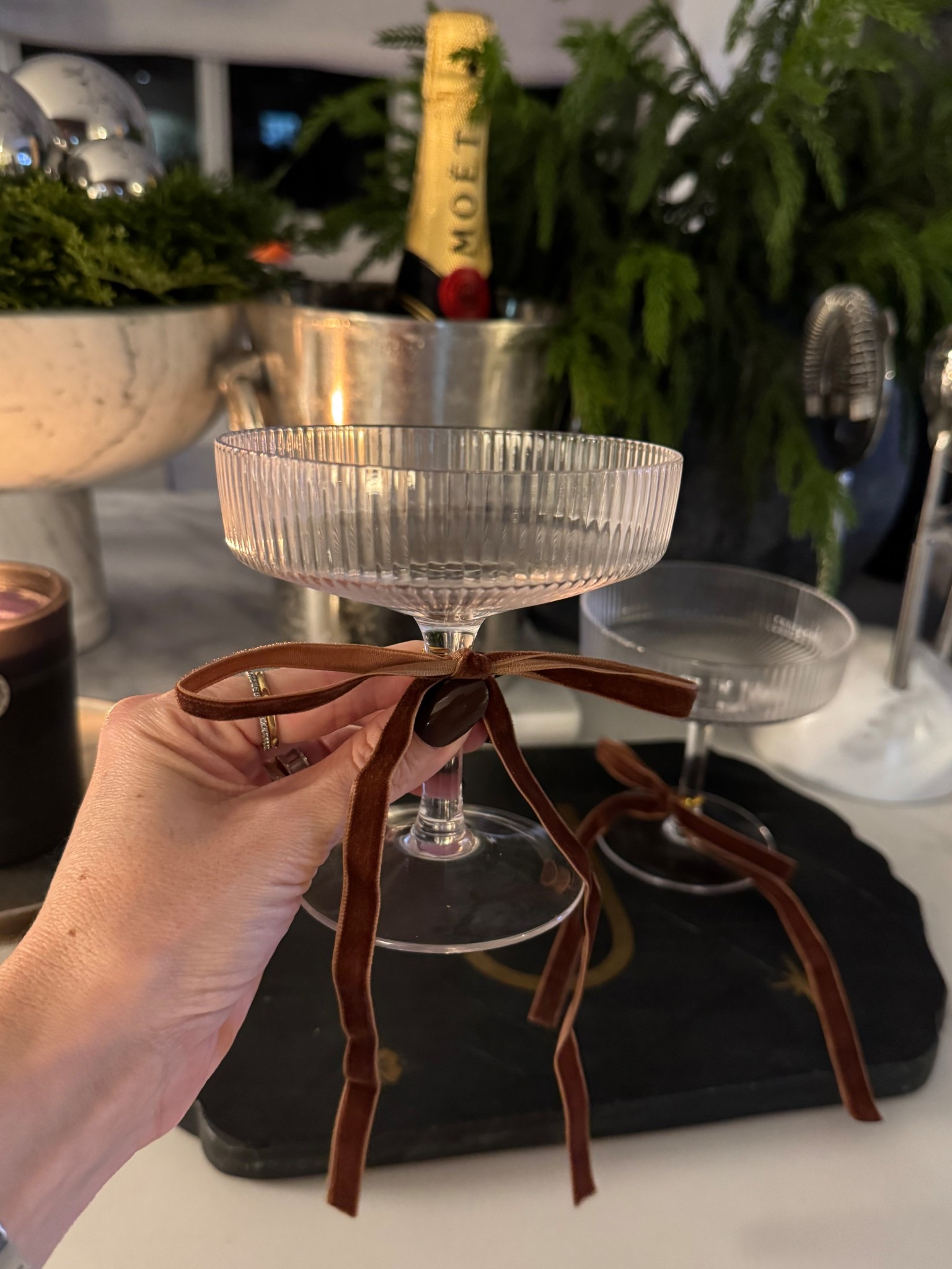 A simple velvet bow automatically elevates your cocktail coupes 🤎✨ #holiday #hosting #cocktail

#LTKHome #LTKHoliday #LTKSeasonal
