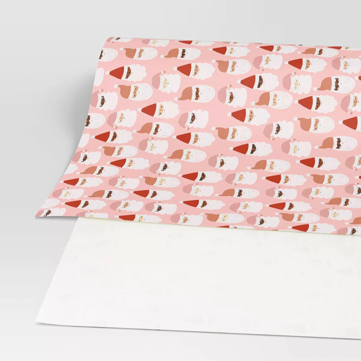 20 sq ft Santa Faces Christmas Gift Wrap Pink - Wondershop™ | Target