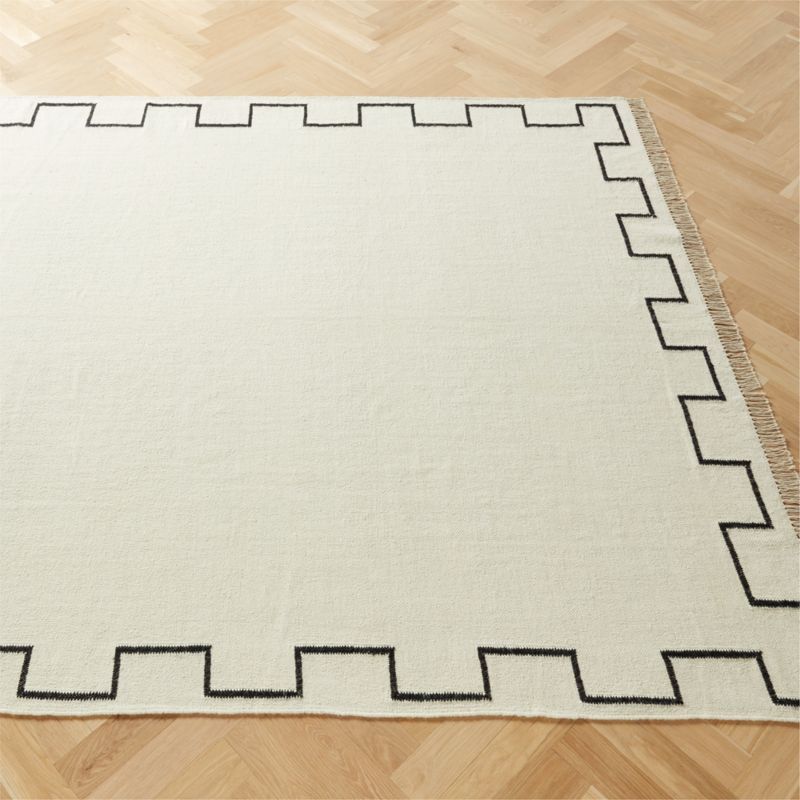 Ziyad Bordered Handwoven Ivory and Black Dhurrie Area Rug | CB2 | CB2