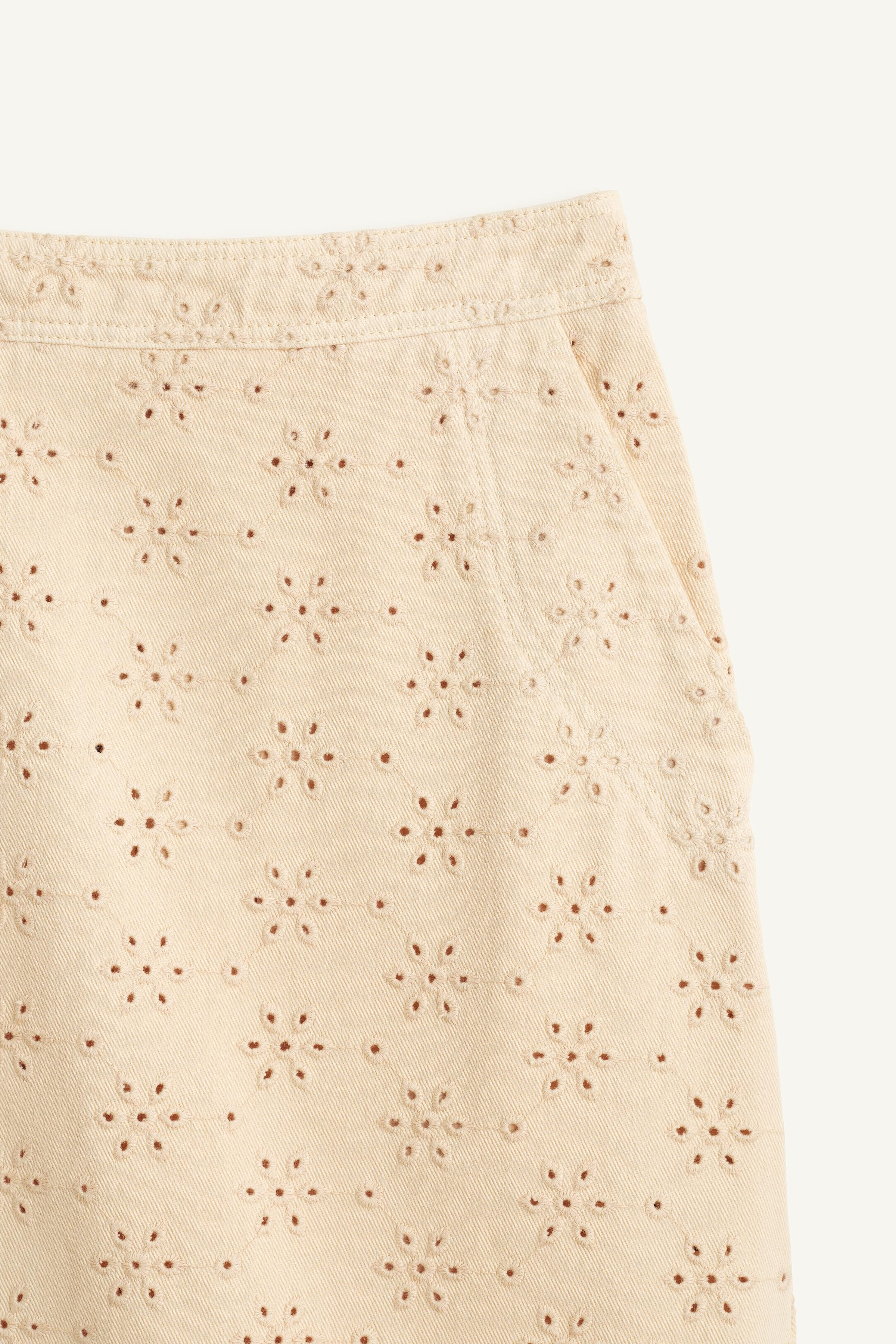 Midi skirt made from 100% cotton fabric. Mid-rise. Side pockets. Featuring perforated embroidery ... | Zara US