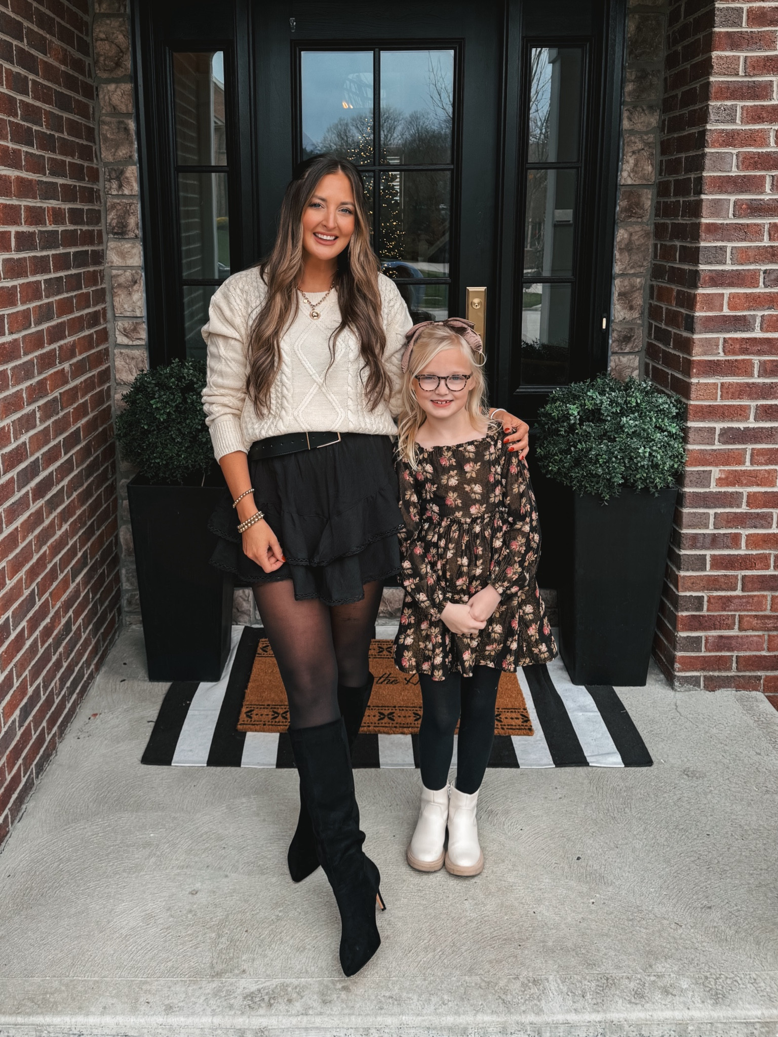 Amazon fall winter outfit idea! I love this oversized cable knit sweater paired with the cutest skort. My whole outfit is Amazon! 

I sized up in the skort 
Sweater true to size 
Sized up a half in the boots



#LTKStyleTip #LTKHoliday #LTKFindsUnder50