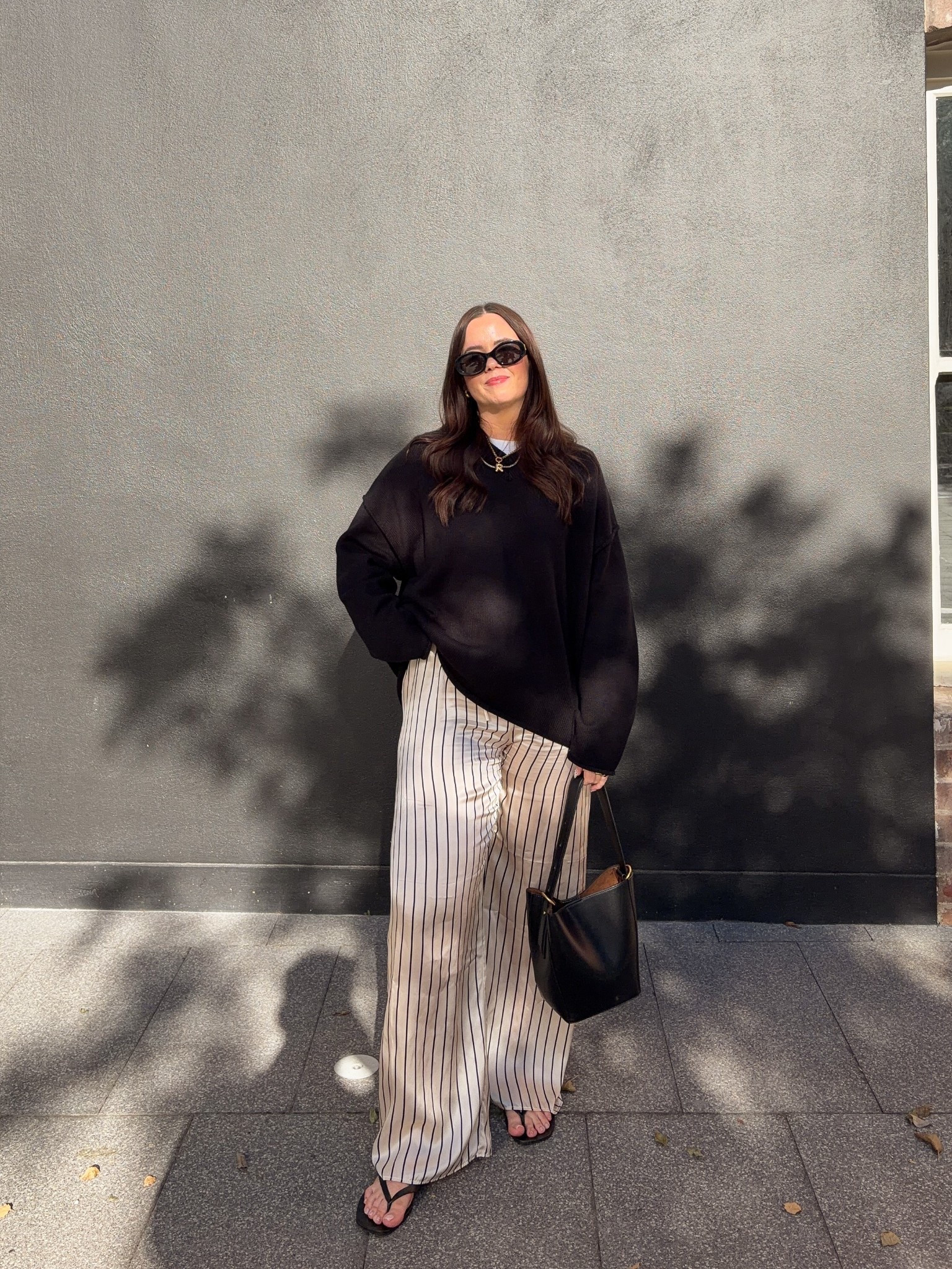 Dissh oversized black knit: size L
Dissh silk stripe pants: size 14
Nelson Made leather thongs
Zara bucket bag 

#LTKmidsize #LTKaustralia #LTKautumn