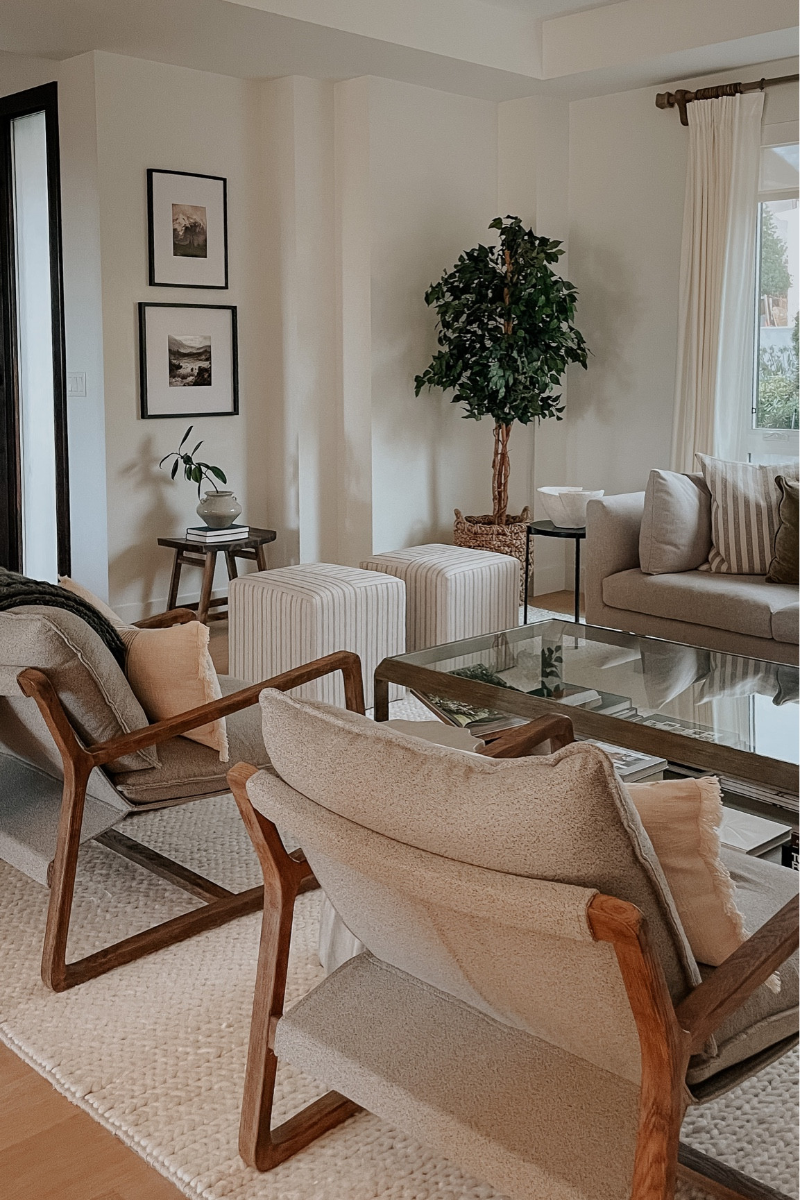 Living room. Cube ottomans. Sling back occasional chair. Faux ficus tree. Home decor. Living room inspiration. Target finds. Amazon finds  

#LTKhome #LTKstyletip #LTKFind