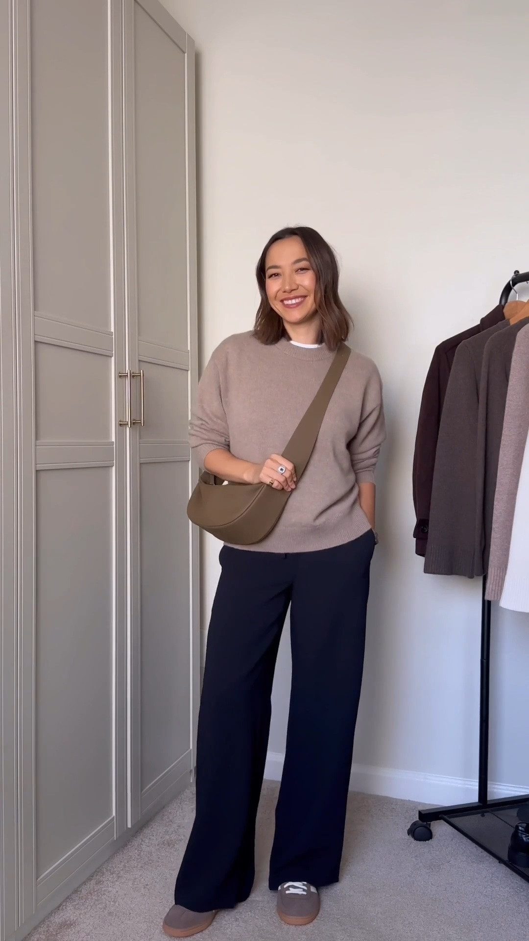 Comfy chic outfit 

Aritzia cashmere sweater 
Mango tee 
Aritzia lodge pant — wrinkle-free, wash very well
Adidas handball spezial sneakers 
Sam Edelman flats 

Fall outfit / fall style

#LTKSeasonal #LTKootd