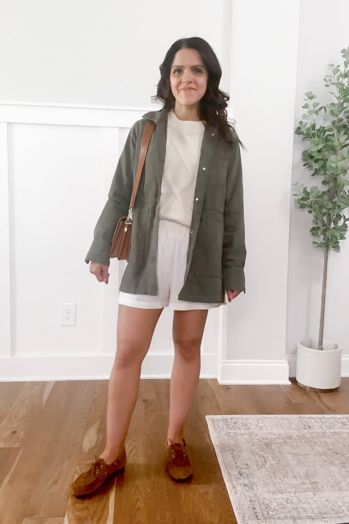 Transitional summer to fall outfit idea: knit sweater, white shorts, utility jacket, crossbody bag, boat shoes 

#summertofall #transitionalstyle 


#LTKStyleTip #LTKSeasonal