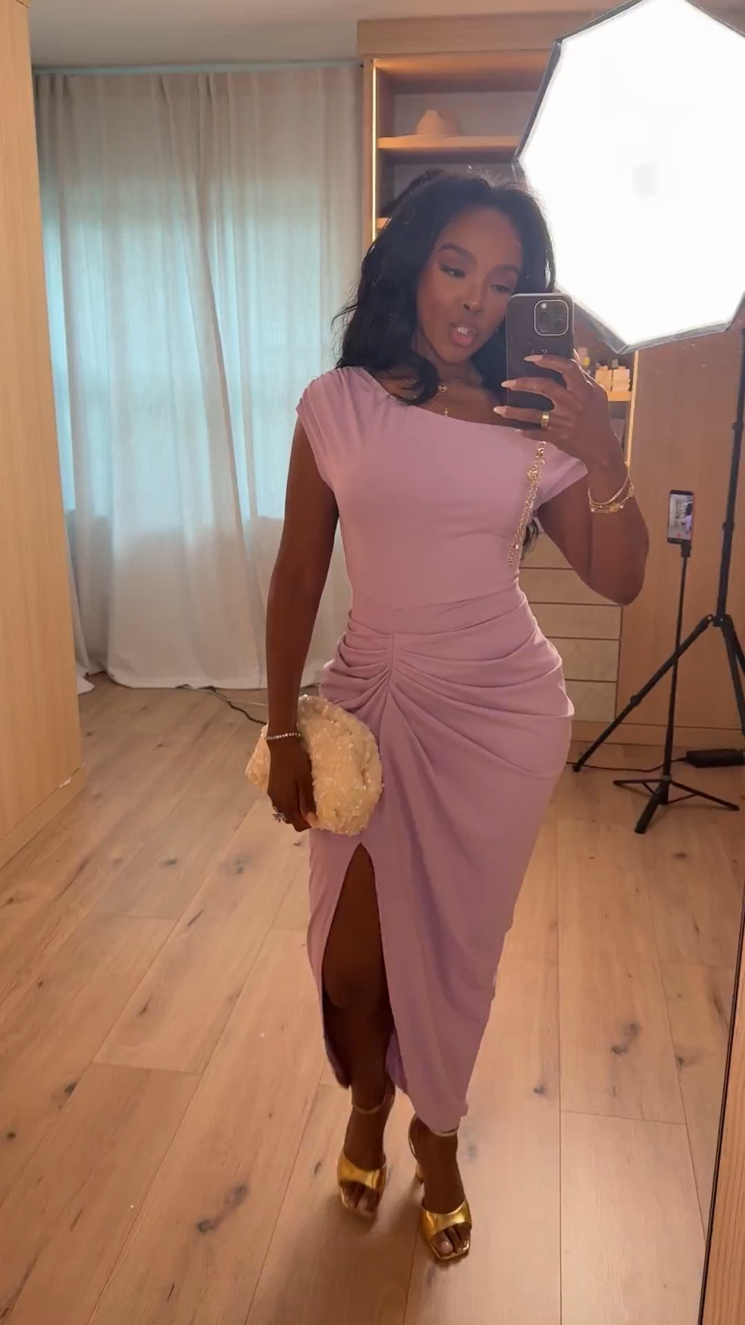 Scroll to shop this soft pink moment 💕

This draped midi is effortlessly elegant with the flattering ruching and side slit—perfect balance of feminine and elevated. The soft pink shade makes it feel romantic while still being super wearable.

Perfect for date night, weddings, events, or vacation dinners.

📏 Measurements: 5’4”, 140 lbs, 34D bust, 27” waist, 40” hips

Follow me on Instagram and YouTube @kirasfashionfinds

