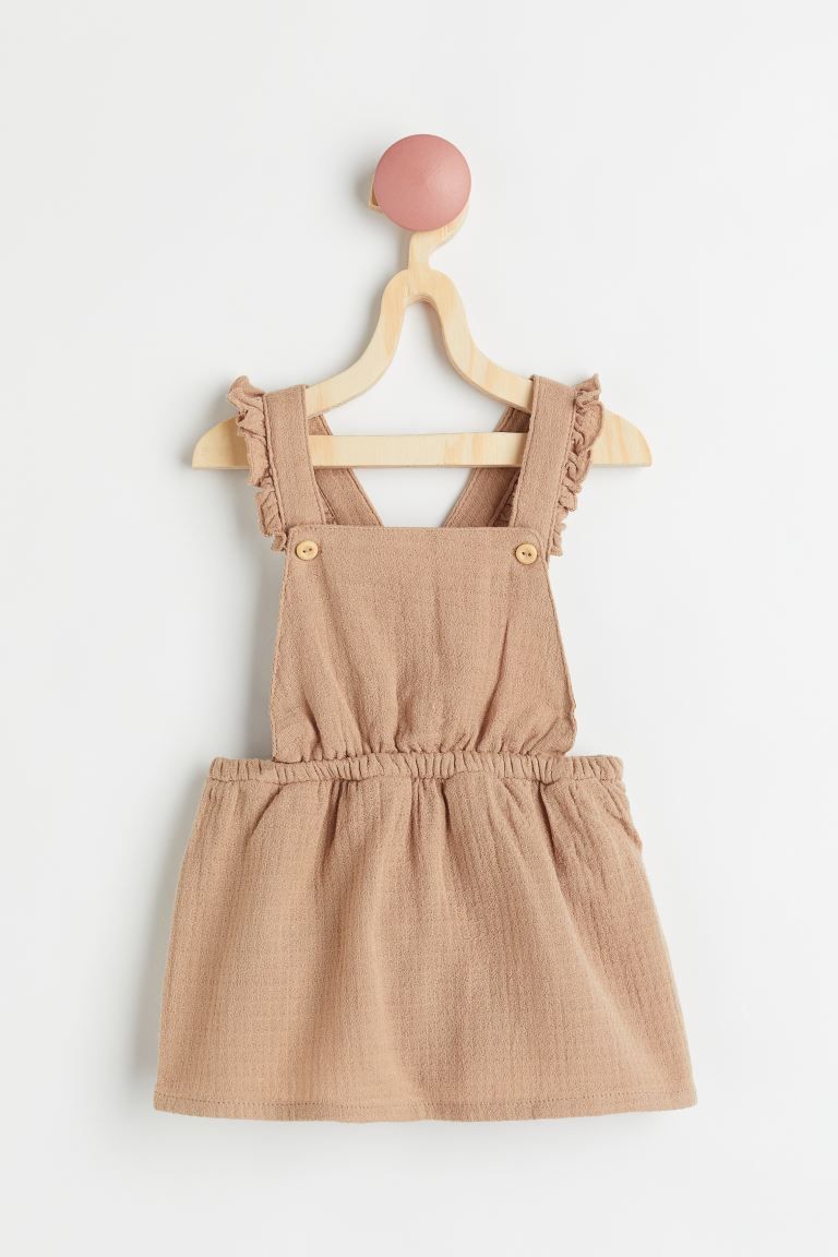 Baby Exclusive. Overall dress in woven, waffled organic cotton fabric. Ruffle-trimmed straps with... | H&M (US)