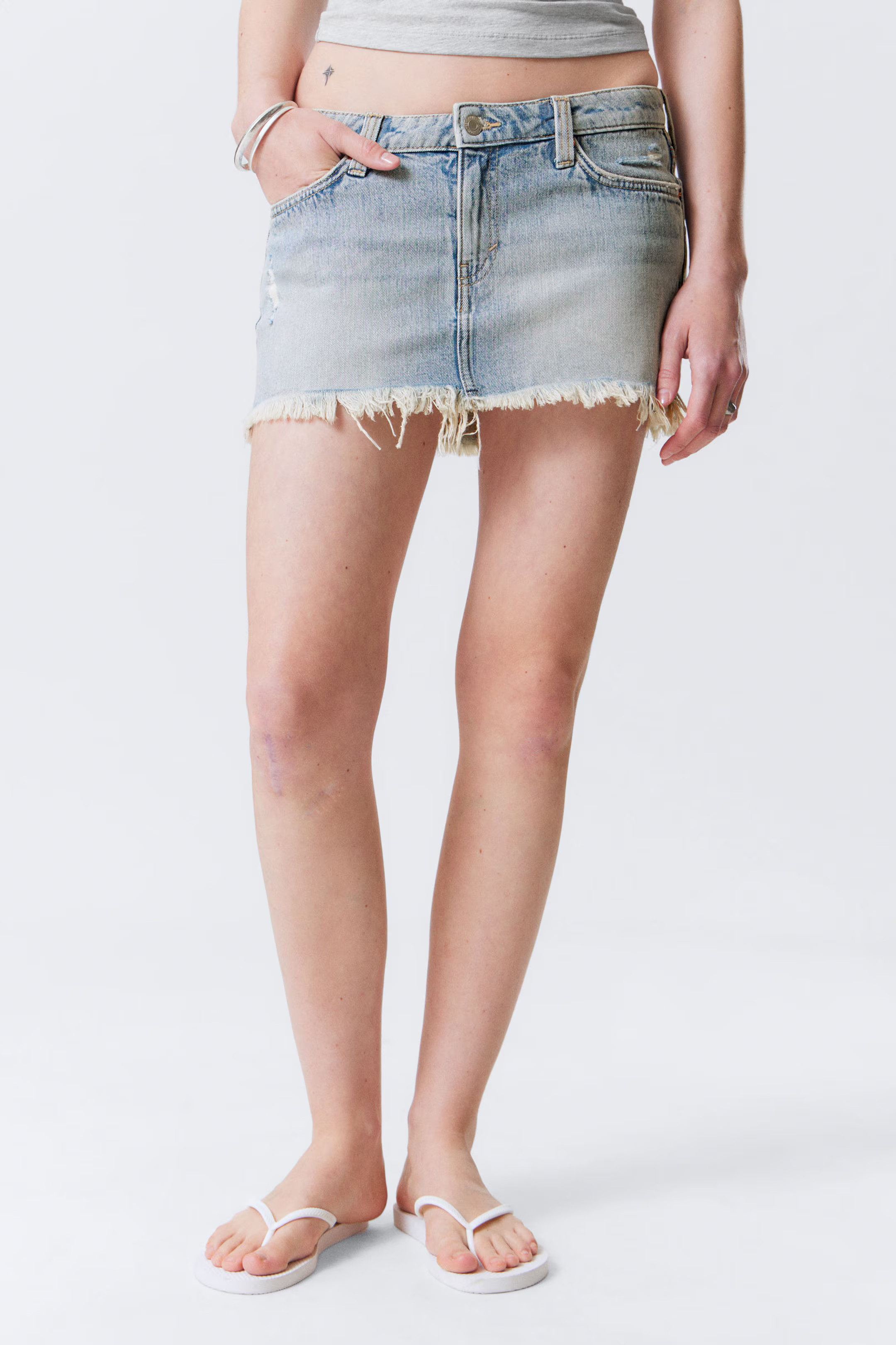 Centure Low Rise Frayed Denim Mini Skirt | Weekday