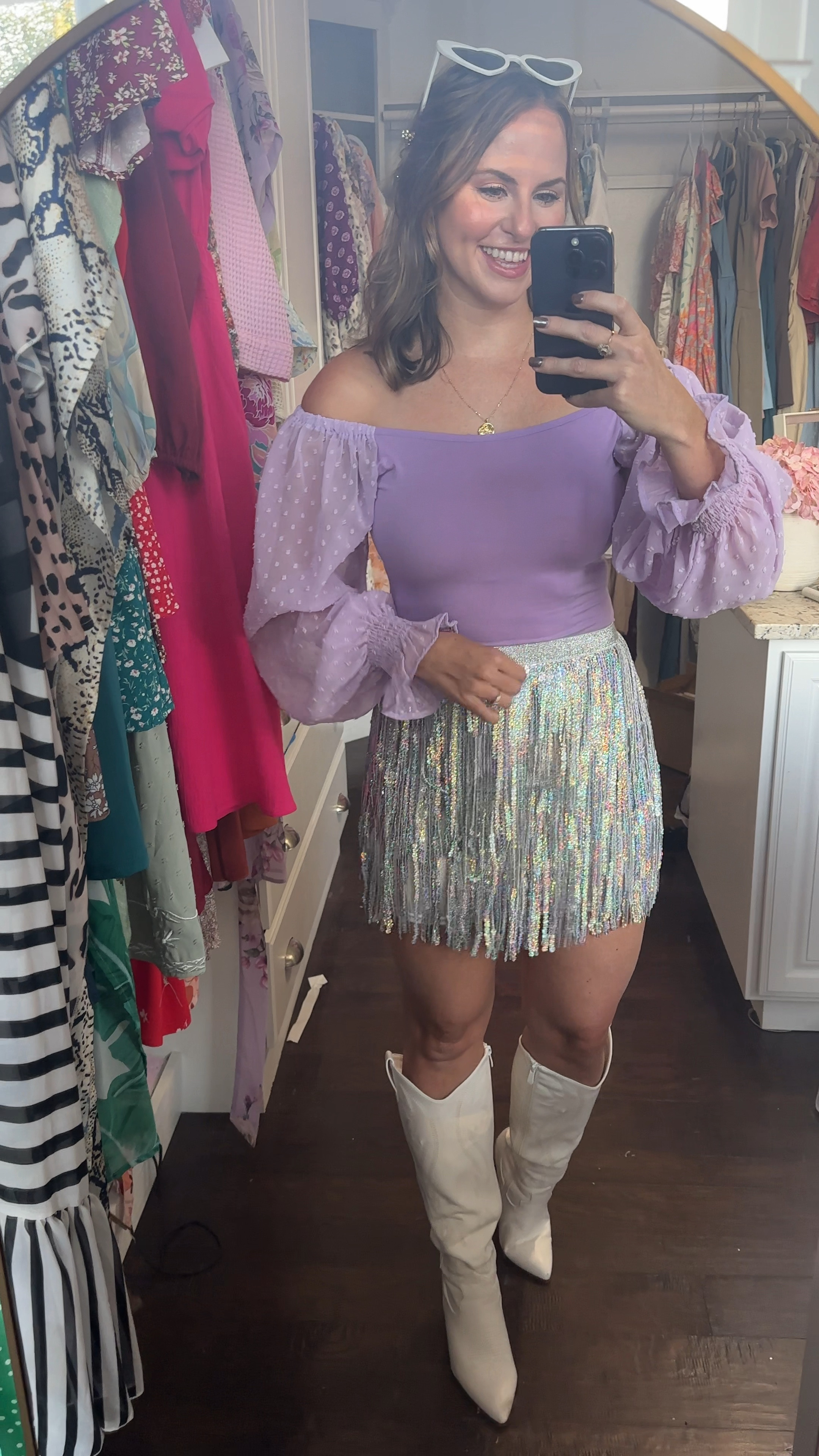 Fun concert outfit, party dress or Vegas outfit! This sequin fringe skirt is SO adorable! It’s stretchy and also has a zipper in the back. It’s high waisted and has elastic waist band. Paired it with this black top that gives the look of a bodysuit, white cowboy boots, heart sunglasses & sparkly hair clips. 

Eras tour outfit, Meghan trainor concert outfit, Taylor swift outfit , Nashville country concert outfit, Halloween costume, fall outfit, Las Vegas dress , fringe skirt, white cowgirl boots

⬇ https://liketk.it/4TEuj #ltkstyletip #ltkfindsunder50 #ltkvideo

#LTKFindsUnder50 #LTKStyleTip #LTKParties