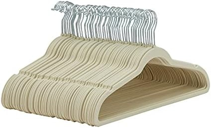 Amazon Basics Slim, Velvet, Non-Slip Suit Clothes Hangers, Ivory/Silver - Pack of 50 | Amazon (US)