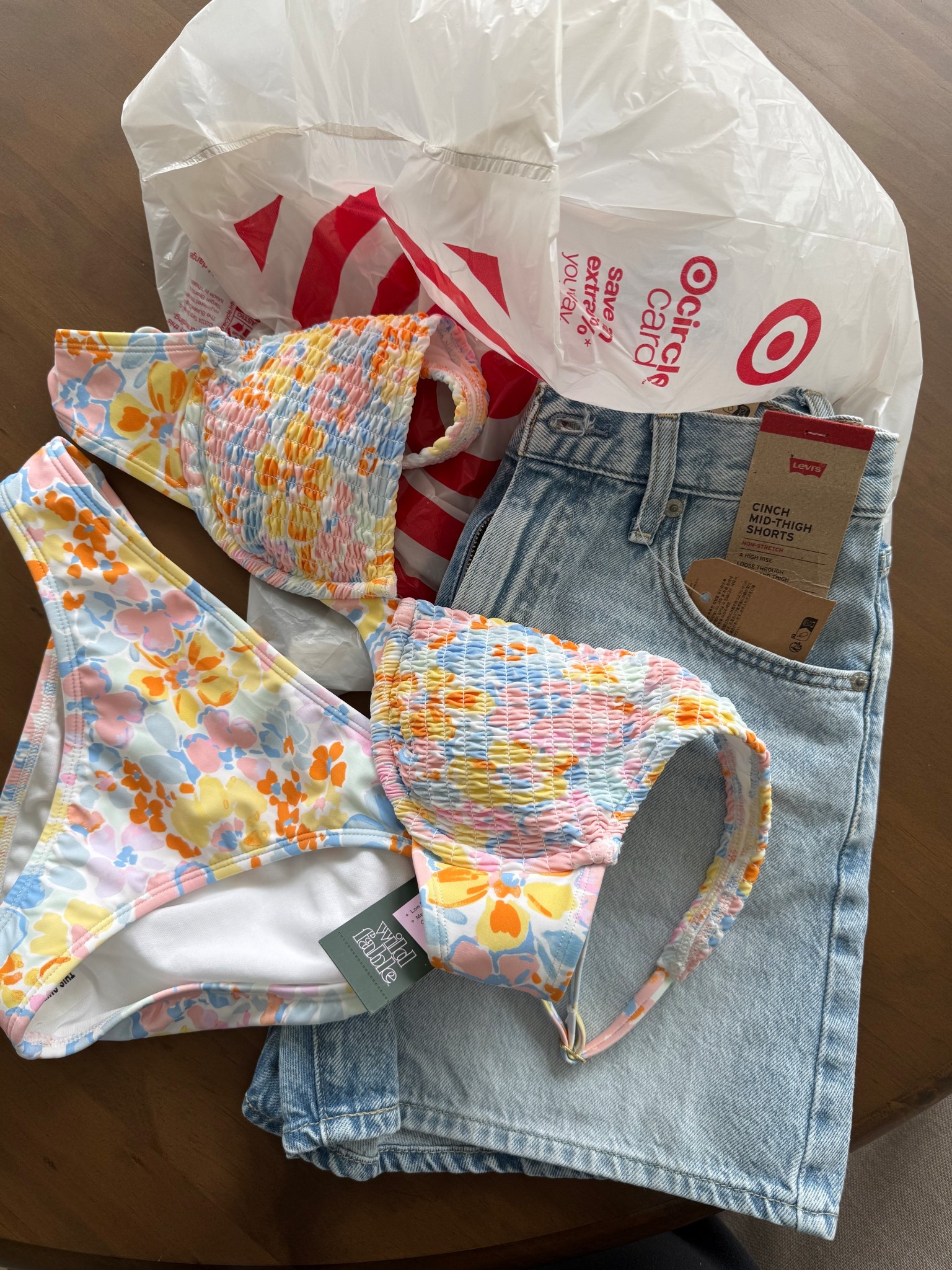 Picked up these cinch waist Levi shorts from Target.. ended up getting this cute floral bikini too

#LTKSeasonal #LTKFestival #LTKSwim