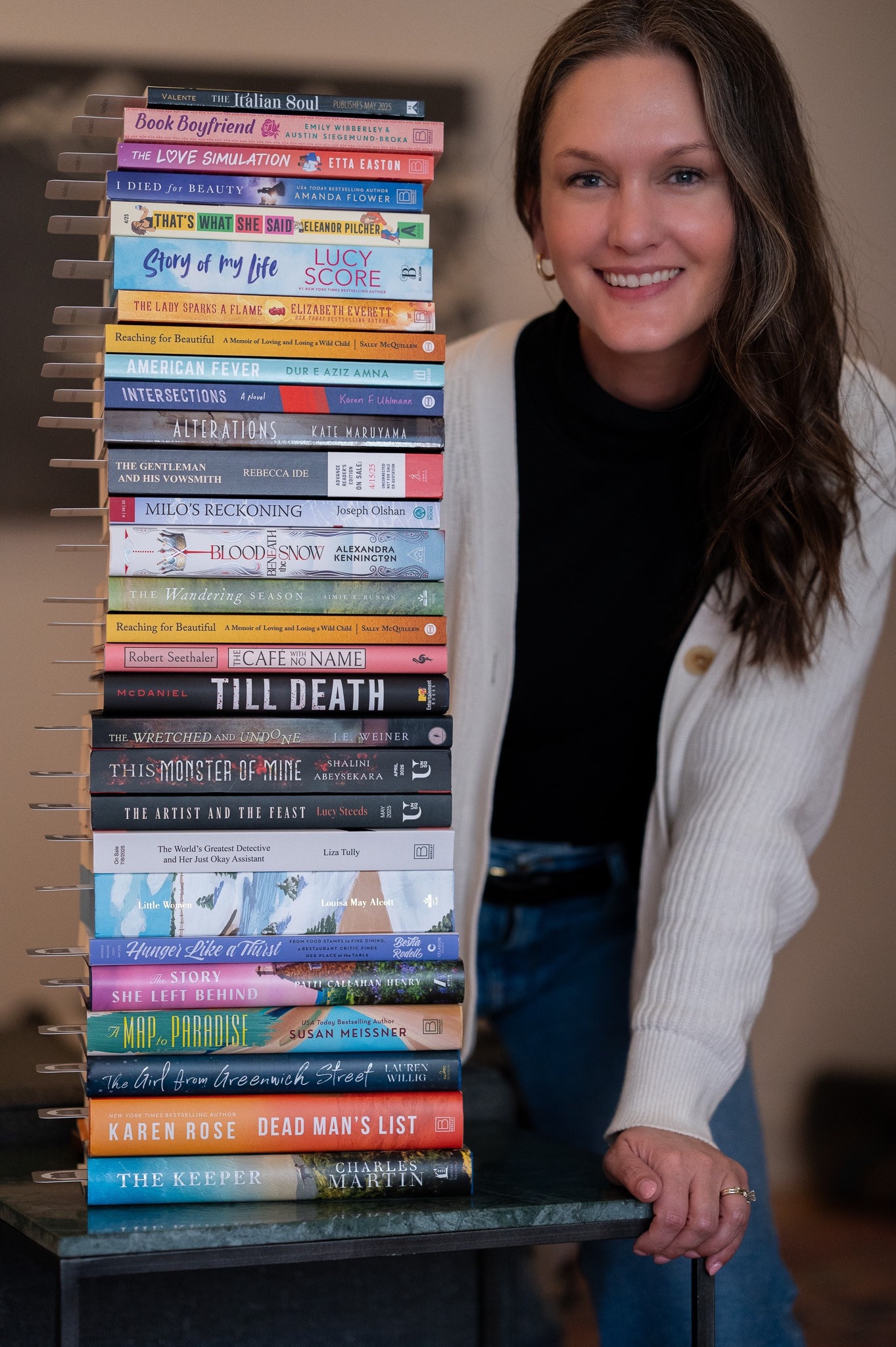 Layered in an effortlessly chic ivory cardigan over a sleek black turtleneck, she feels both polished and at ease. Her wide-leg jeans, cinched perfectly with a black belt, create a silhouette that’s timeless yet modern, while gold hoop earrings add just the right touch of elegance. A fresh stack of book mail sits before her, each package a small thrill, waiting to be unwrapped. As she carefully peels back the paper and runs her fingers over the embossed covers, she savors the quiet joy of discovery. In the last week of March, as the season teeters between winter’s farewell and spring’s arrival, she feels like the main character in her own life—poised, curious, and embracing the anticipation of what’s to come.

#LTKStyleTip #LTKFamily #LTKHome