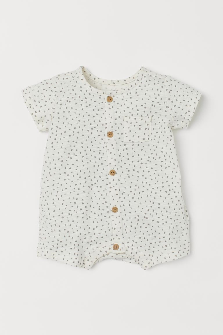 Romper suit in soft cotton slub jersey with short sleeves and short legs. Buttons at front, chest... | H&M (US + CA)