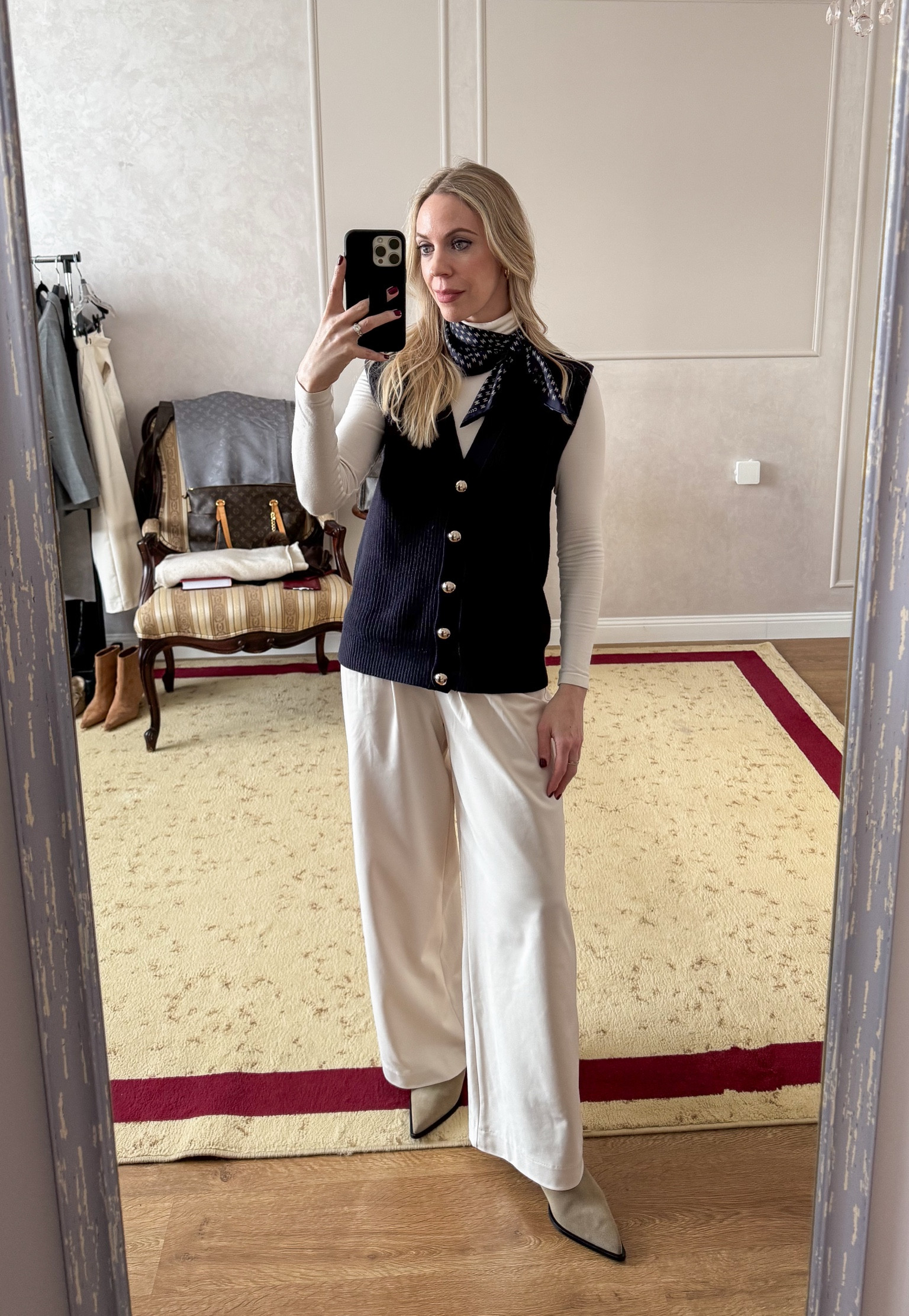 Spring work wear, office look, sweater vest (under $30), silk scarf, cream wide leg pants 

#LTKWorkwear #LTKOver40 #LTKFindsUnder50