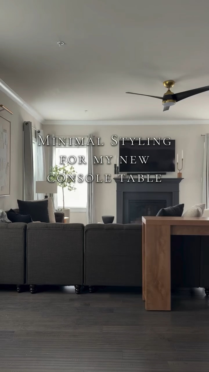 Minimal styling for my new console table. 🖤

I wanted something that felt substantial but still clean — warm wood, strong lines, and just enough styling to let it breathe.

When I style minimally, I focus on:
• height
• texture
• negative space

Not every surface needs to be filled. Sometimes restraint makes the strongest statement.

If you’d like the links to this console and the pieces I used,
comment CONSOLE and I’ll send them your way. ✨

______________________

#houseofcovington #minimalstyling #consoletable #consoletabledecor #consoletablestyling

#LTKHome #LTKSpringSale