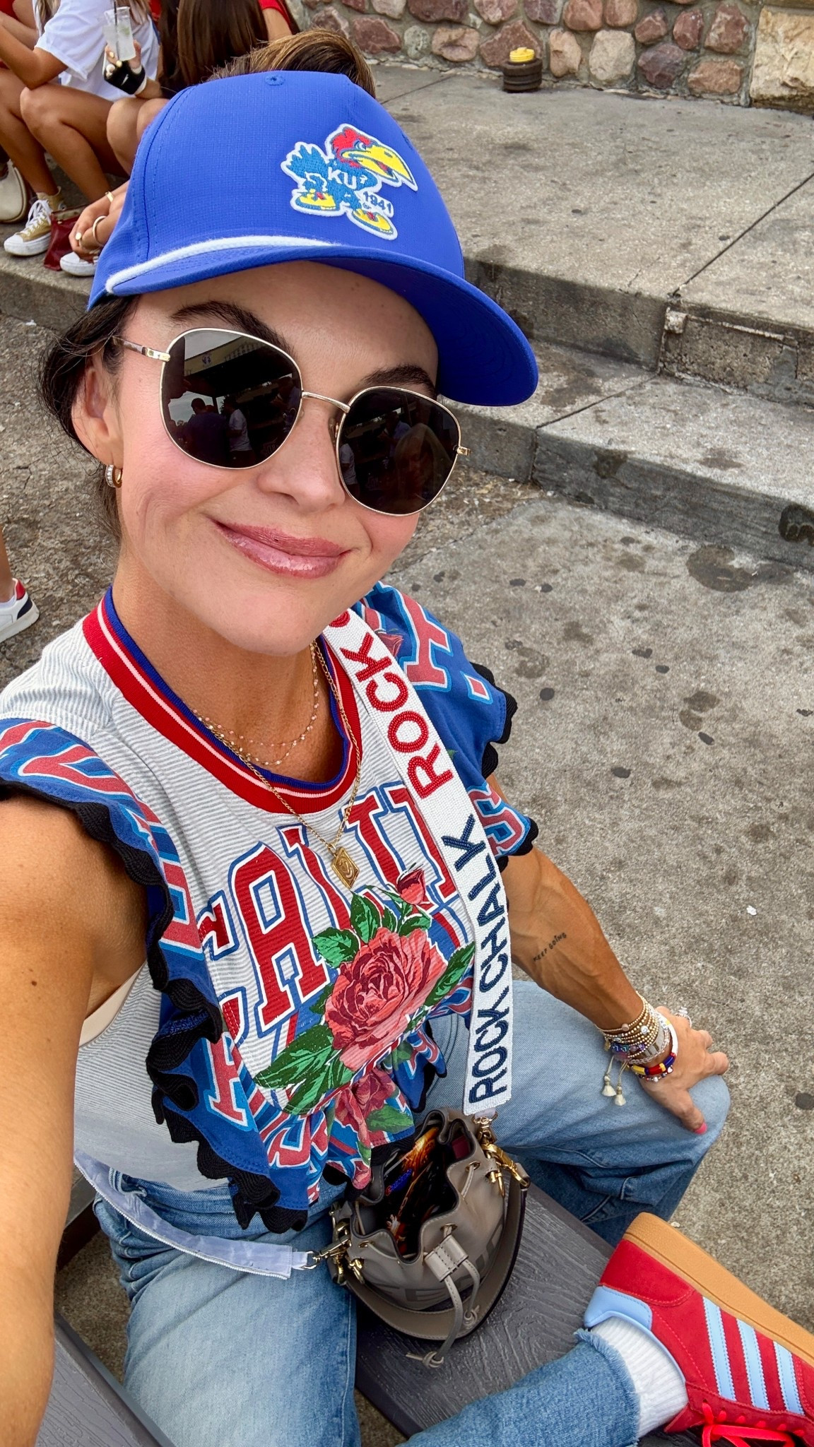 Fun, sporty outfit!
Great for KU games! 🫶🏻

Sports, sunglasses, anthro, ruffle top, denim, wide leg jeans, petite style

#LTKShoeCrush #LTKU #LTKFindsUnder100