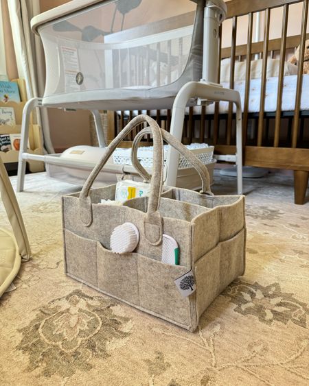 Our diaper caddy for when baby arrives! Love having this to take to the main floor all day. Filled with diapers, wipes, extra clothes, burp cloths, combs, nursing pads (basically anything I’ll need throughout the day!) 🤍

Amazon finds, Amazon baby find, Amazon diaper caddy, Amazon favorites, baby girl, baby must-haves 

#LTKfindsunder50 #LTKbaby #LTKfamily