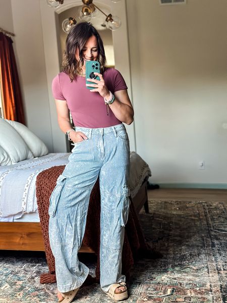 Target look for less version of the Free People - We the Free Moxie Stripe Barrel Jean 

Only $32!!

Size up one size!