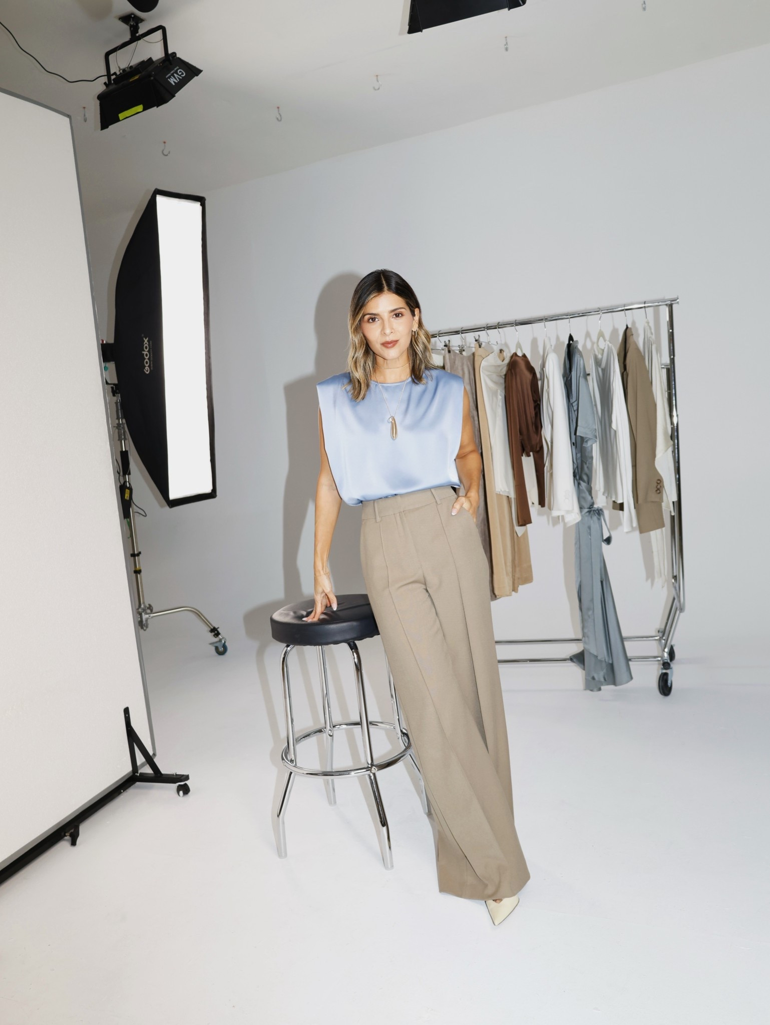 Episode 2: Elegance in the Everyday. I styled a sky blue silk top with brown trousers and neutral accessories. 