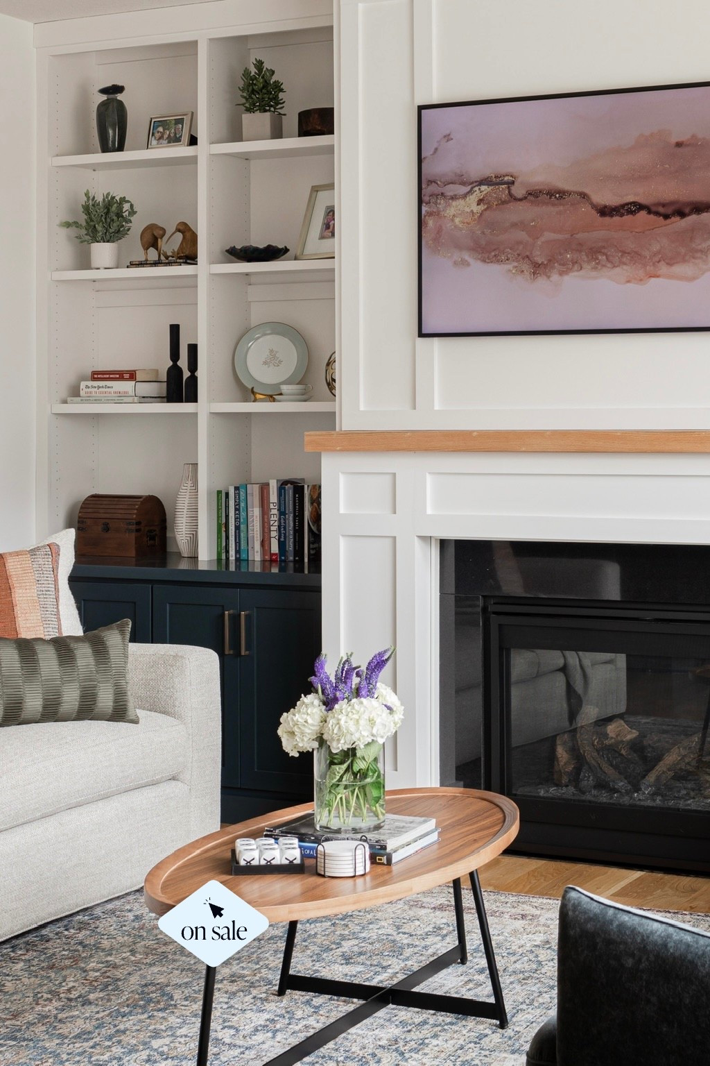 This oval coffee table is currently on sale @luluandgeorgia but not for long! Shown is the walnut finish with a black steel base. Honestly, this wood coffee table is so loved that I’ve used in multiple interior design projects! Shown here in the living room from the #IGHnewbuild project.

#LTKHome #LTKSaleAlert