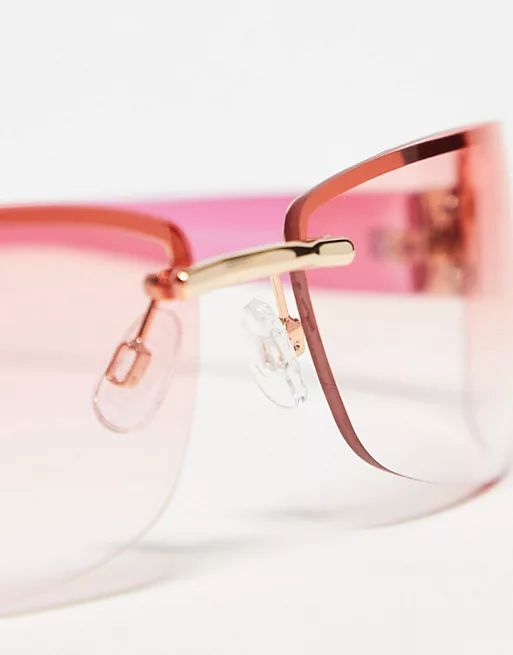 ASOS DESIGN 90s wrap rimless sunglasses in pink | ASOS (Global)