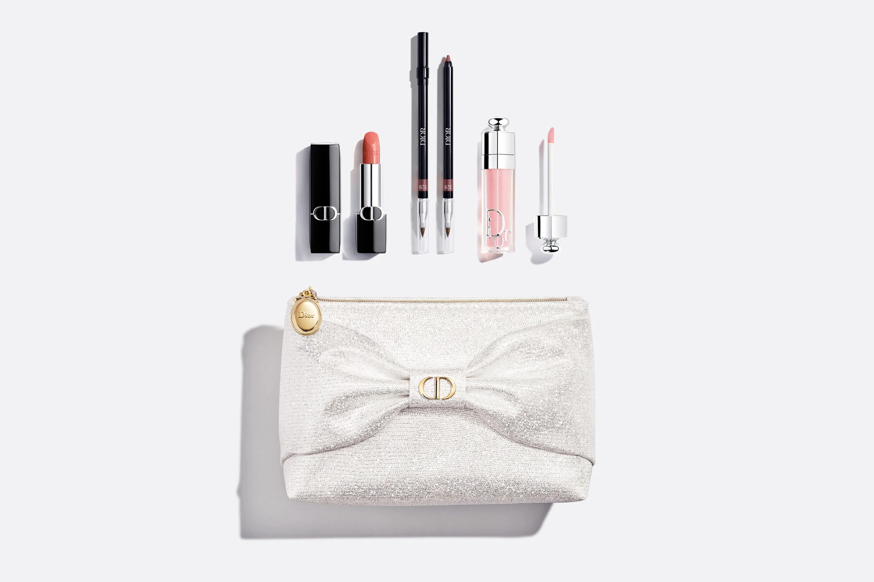 Couture Lip Essentials Holiday Gift Set 2026 Edition-Plumping gloss in 001 Pink, lipstick in 100 Nude Look, and lip liner in 329 Nude Blush | Dior Beauty (US)