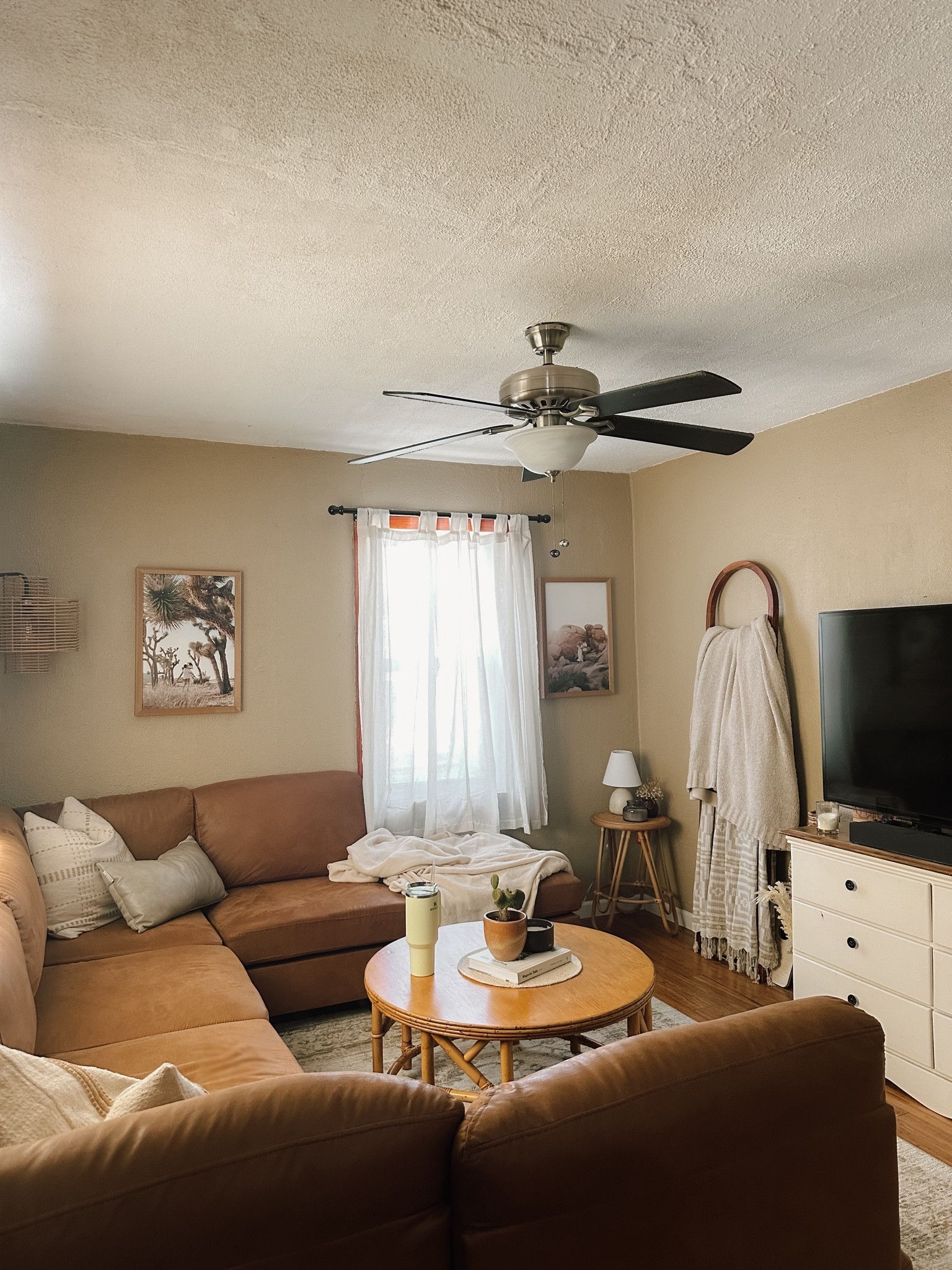 Stying our simple starter home living room! Our space isn't the biggest and most extravagant but it's so perfect for us and so cozy! My style is very much themed as a desert dweller. Even though we live on a river in Missouri, I like to feel transported into the desert when I'm at home! 

#LTKstyletip #LTKhome #LTKfindsunder50
