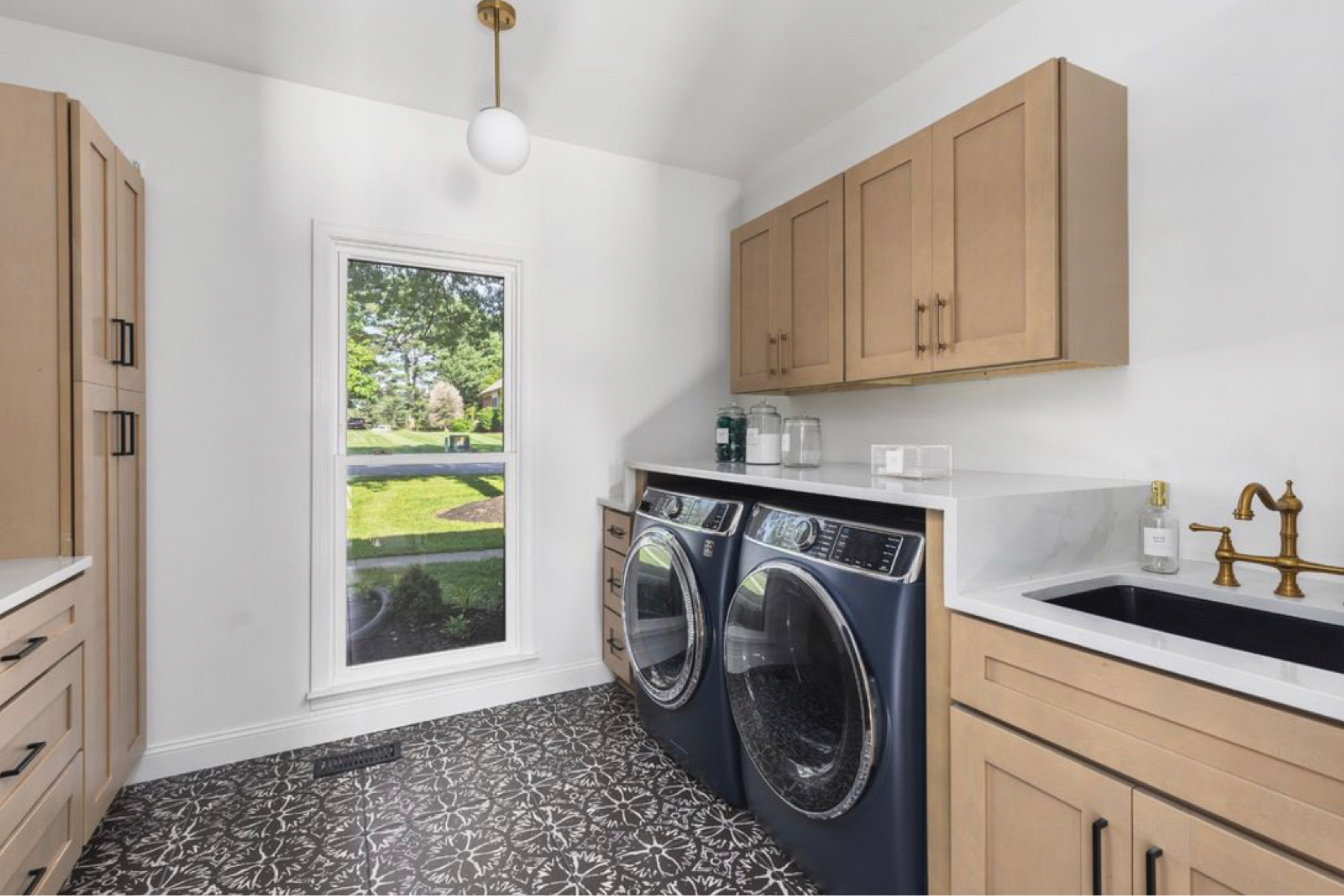 The most perfect laundry room. I absolutely love this washer and dryer! The waterfall countertop is a must with front loads! Keeping all our soap on the top in glass jars makes life so much easier! Also, the sink is a dream! 

#LTKU #LTKHome #LTKSaleAlert