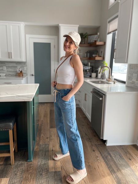 My new favorite jeans for spring and summer just got delivered. Omg love the wide leg and tie waist. Color is absolutely perfect. I styled mine with comfy shoes and cropped tank, but there are so many ways to make these jeans work for you. 

#LTKunder50 #LTKstyletip #LTKFind