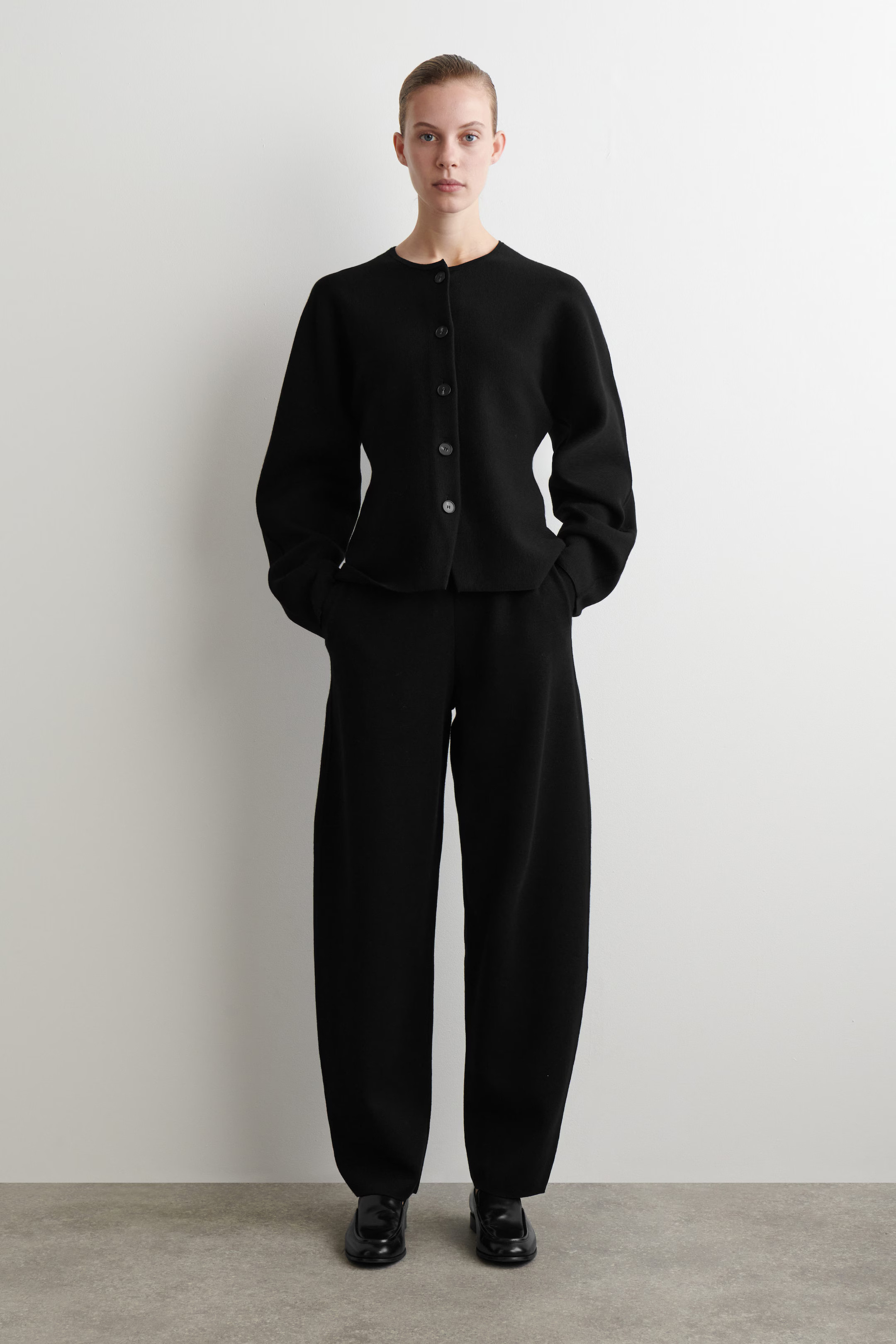 KNITTED WOOL BARREL-LEG TROUSERS - BLACK | COS GB | COS UK