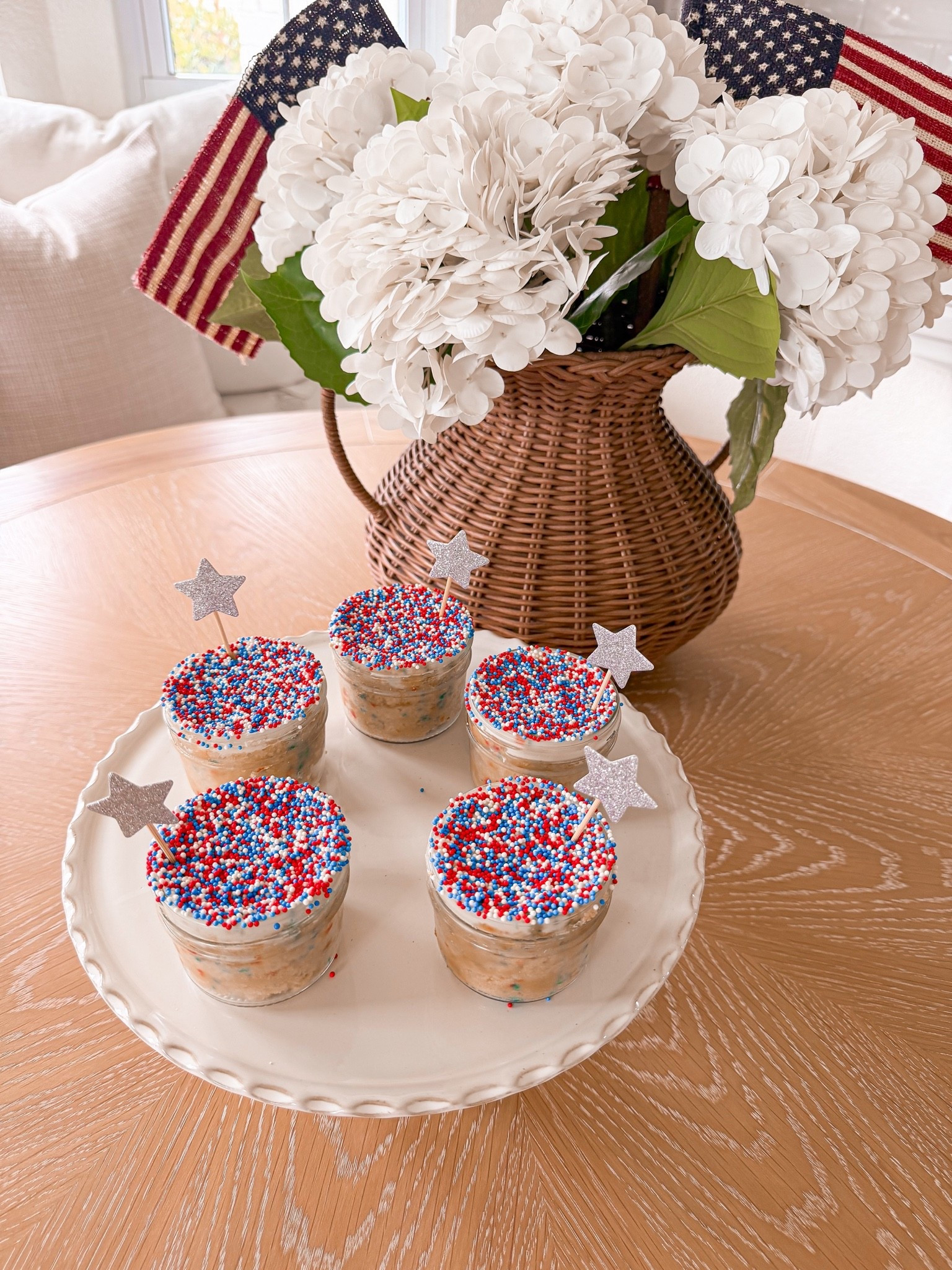 i finally gave the viral dot cakes a try… and patriotic edition might be my favorite 🇺🇸❤️🤍💙
they’re surprisingly easy, so satisfying to make, and would be so cute for a 4th of july party, summer bbq, pool day, or holiday dessert table. ✨

here is the exact steps i did! 

✨ bake your favorite boxed cake mix according to the package directions and let it cool completely.

✨ take a small mason jar and turn it upside down. Press the opening of the jar into the cake to cut out a circle. When you lift it up, the cake should already be sitting inside the jar.

✨ add a scoop of vanilla frosting. I used an ice cream scoop to make it quick and easy.

✨ spread the frosting into an even layer with an offset spatula or butter knife.

✨ dip the top into red, white & blue sprinkles until completely covered.

✨ repeat with additional layers if you’d like, or keep them as single-layer cakes.

that’s it! such a fun and easy 4th of july dessert ❤️🤍💙

p.s. i popped mine in the fridge before serving and thought they were even better cold!


4th of july desserts • patriotic treats • easy summer desserts • red white and blue recipes • holiday baking ideas • viral dot cakes • summer party food • bbq dessert ideas • patriotic party treats • funfetti cake ideas

#LTKSeasonal #LTKHome #LTKfoodie