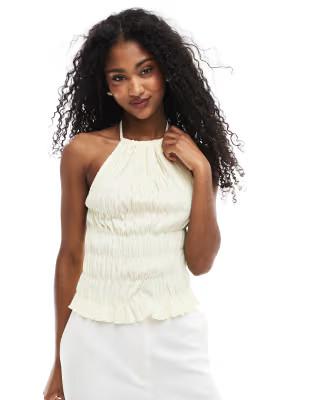 ASOS DESIGN texture shirred halter top in buttermilk | ASOS (Global)