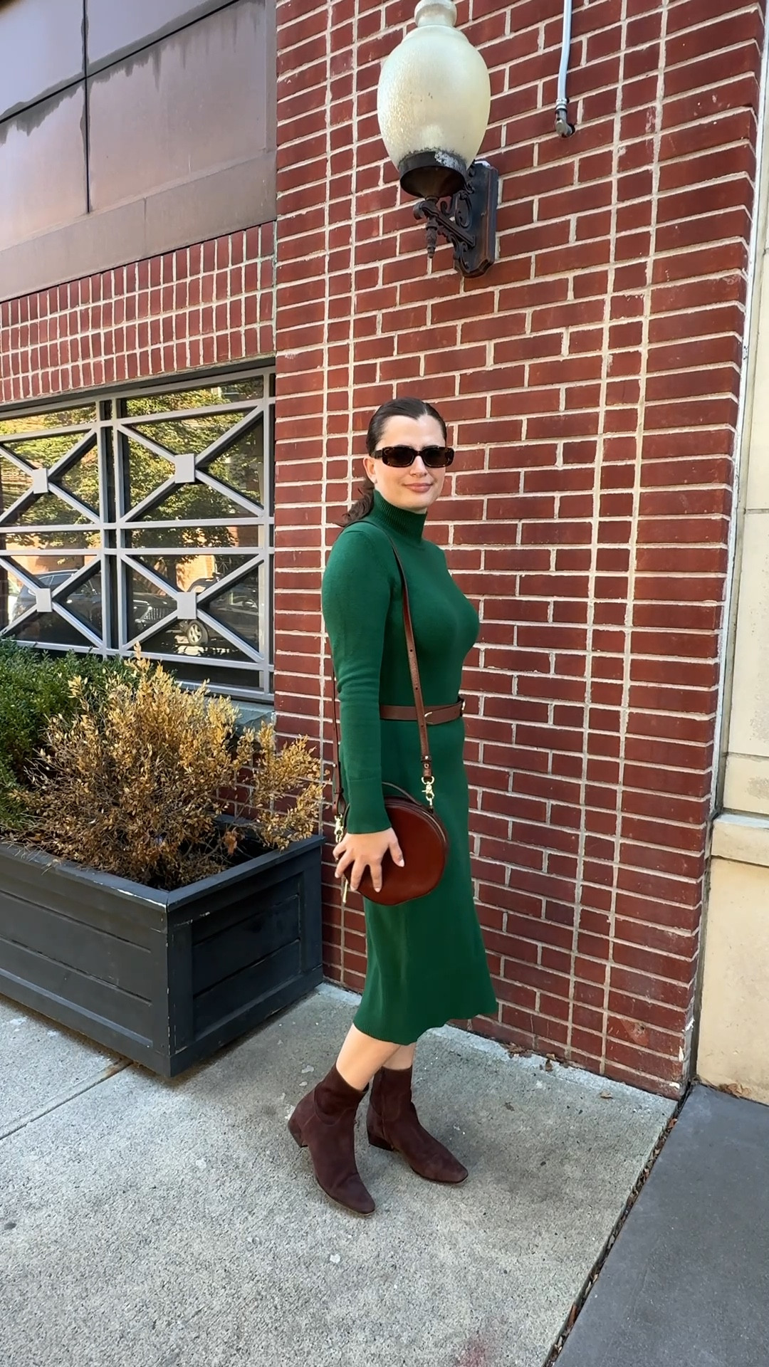 I loved styling this evergreen turtleneck midi dress for fall! I added brown accessories including a belt, some chocolate suede boots and a round brown purse. I love fall fashion and this sweater dress is perfect for transitional temperatures. 

#LTKShoeCrush #LTKFindsUnder100 #LTKStyleTip