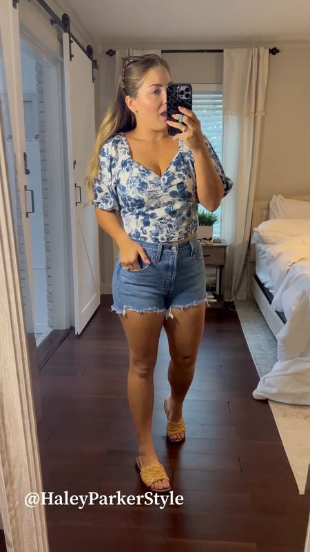 Floral top (in a medium) is very complimentary, I love the sleeves and neckline! Levi’s shorts (color: jazz solo medium indigo) I got my true short size, runs a bit on the smaller side. Shoes tts. #amazonthedrop #levis #summeroutfit #floridamom #samedelman #sandals #beachvacation country concert #countryconcert Morgan wallen concert 

#LTKtravel