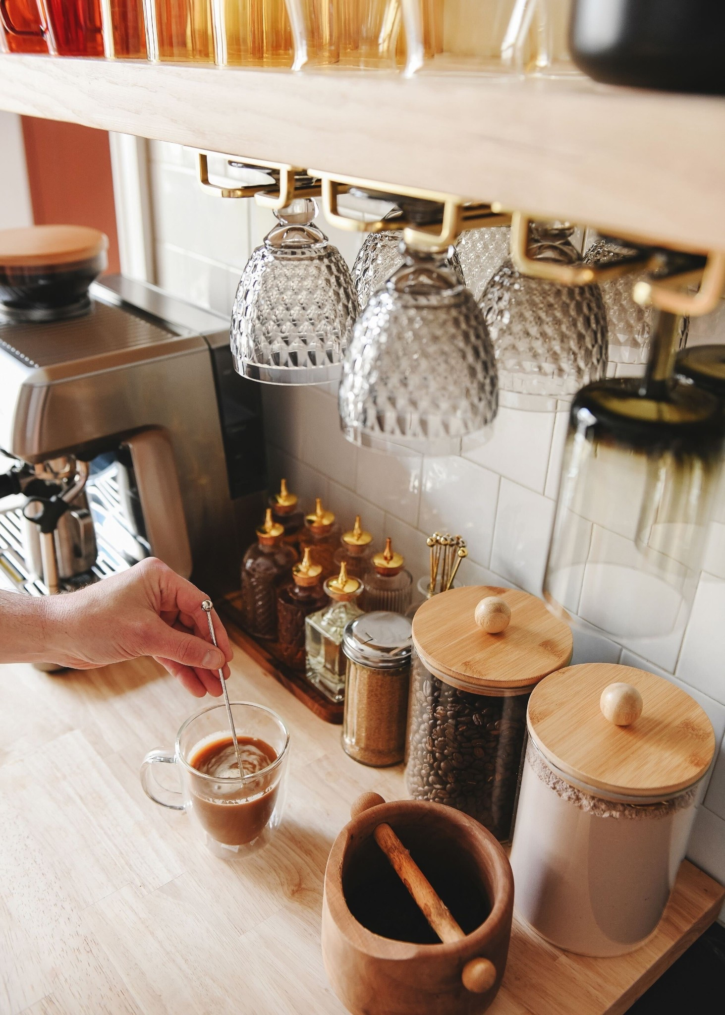 This station does double duty as a cocktail bar when we host gatherings, so there are a few bottles of actual bitters scattered throughout the tray as well as all our syrups for coffee￼

#LTKHome