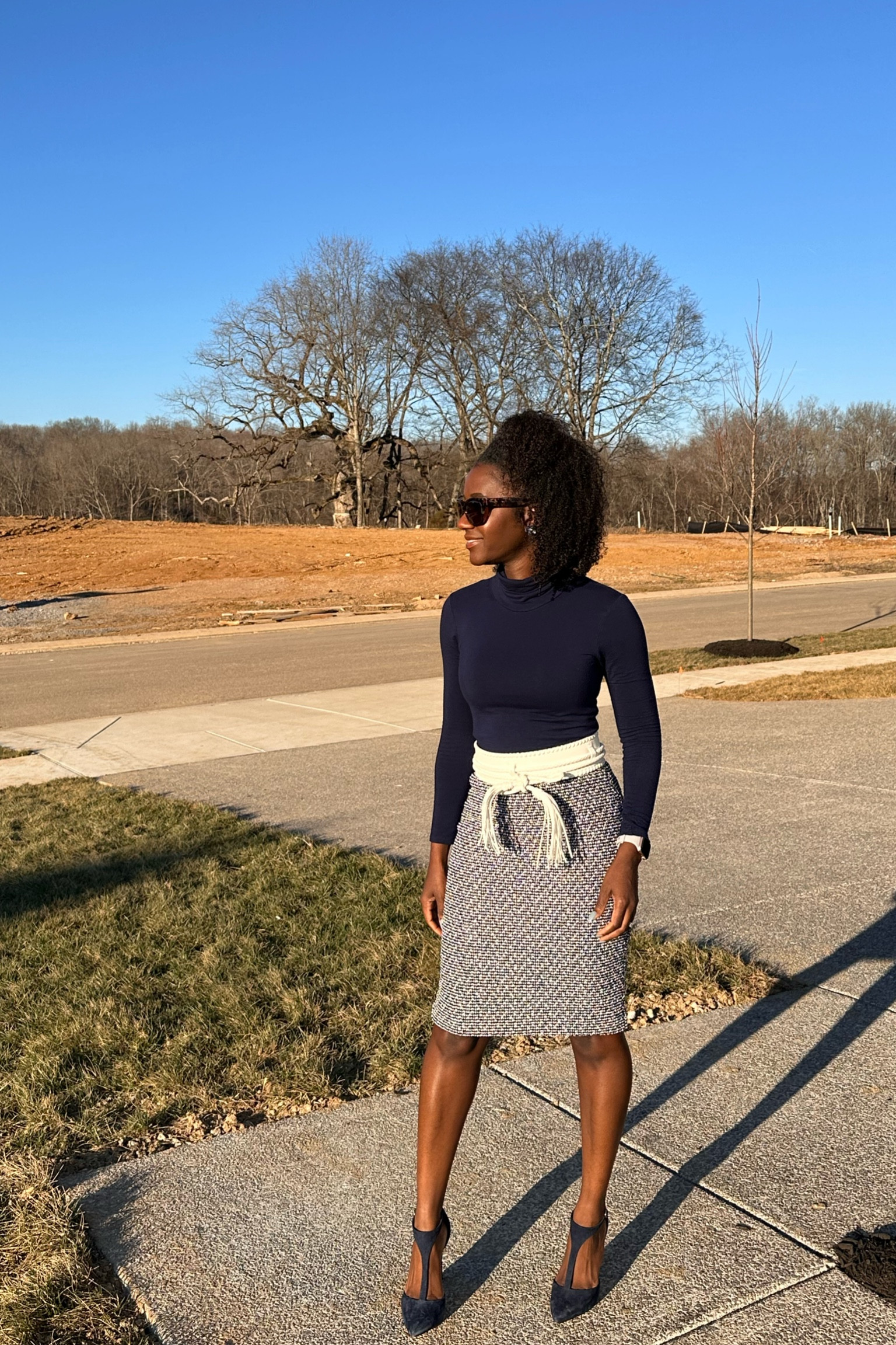 Business Casual. I love this boucle skirt and turtleneck combo. Added a statement belt for some pop. I’ve linked some similar options with different color combos below. 👉🏾

#StylishlyBree #Classic #Timeless 

#LTKsalealert #LTKfindsunder100 #LTKstyletip