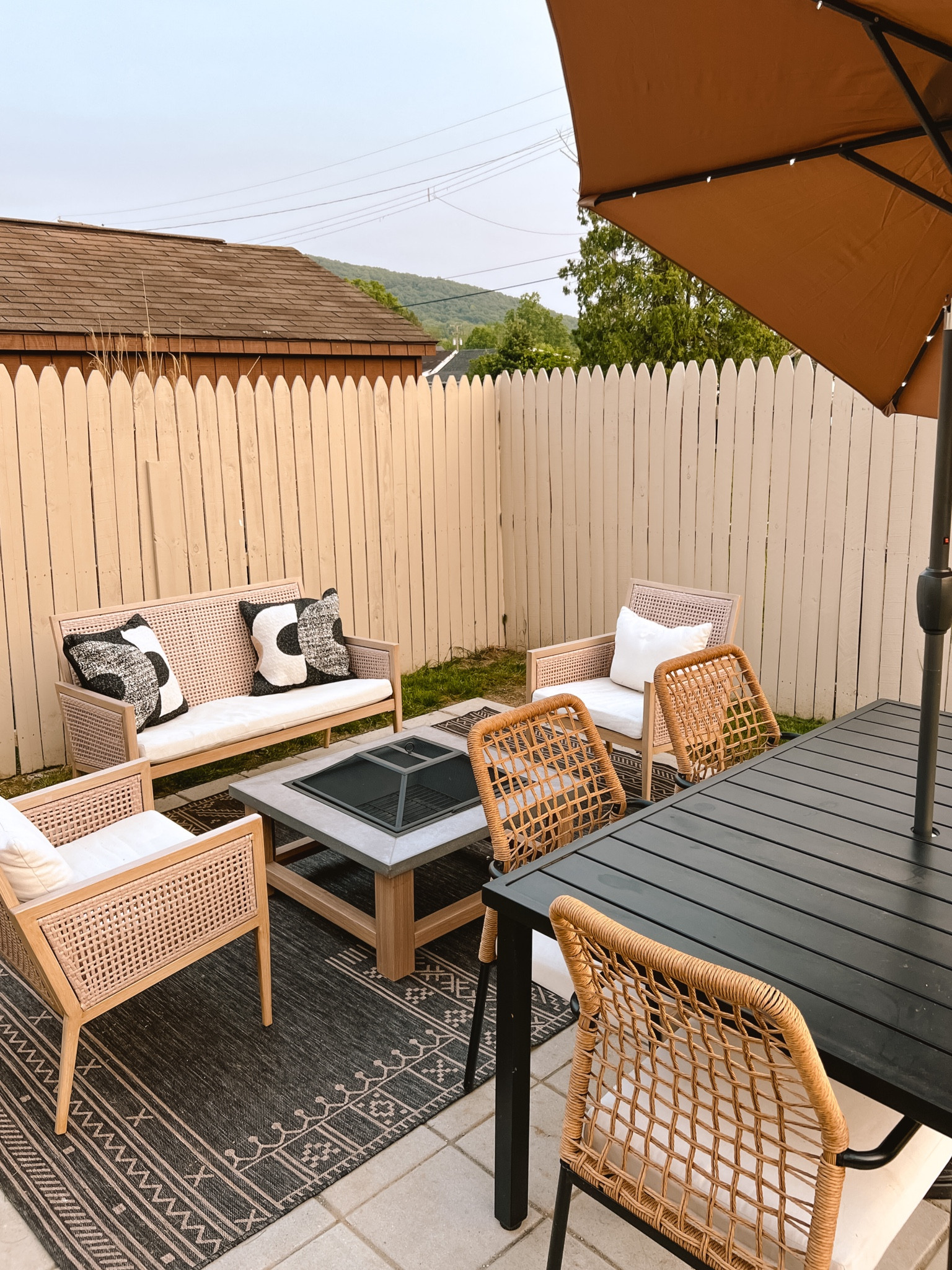 Just set up our new patio umbrella and patio furniture! // outdoor patio set, patio dining set, patio furniture, patio chairs, outdoor dining set, fire pit, patio fire pit, outdoor fire pit, patio umbrella, outdoor umbrella, patio dining table, patio furniture set

#LTKhome #LTKfamily #LTKSeasonal #LTKunder50 #LTKunder100 #LTKFind #LTKstyletip #LTKsalealert