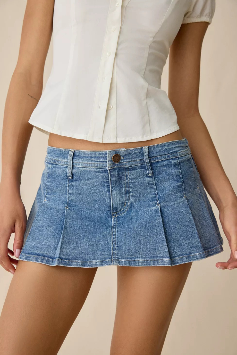 BDG Bad Influence Pleated Low-Rise Denim Mini Skort | Urban Outfitters (US and RoW)