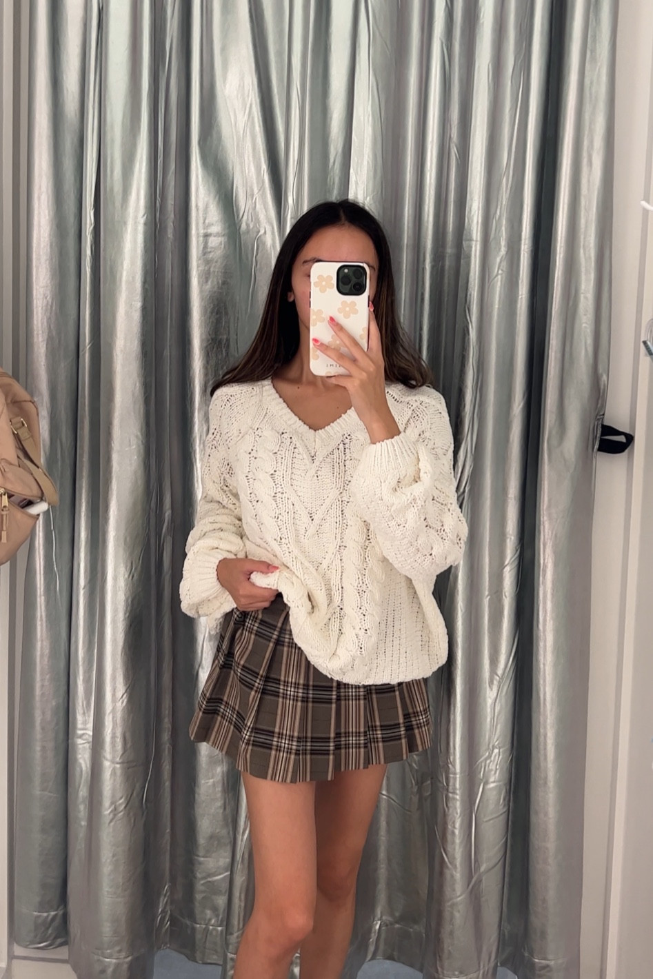 oversized knit sweater and brown plaid mini skirt